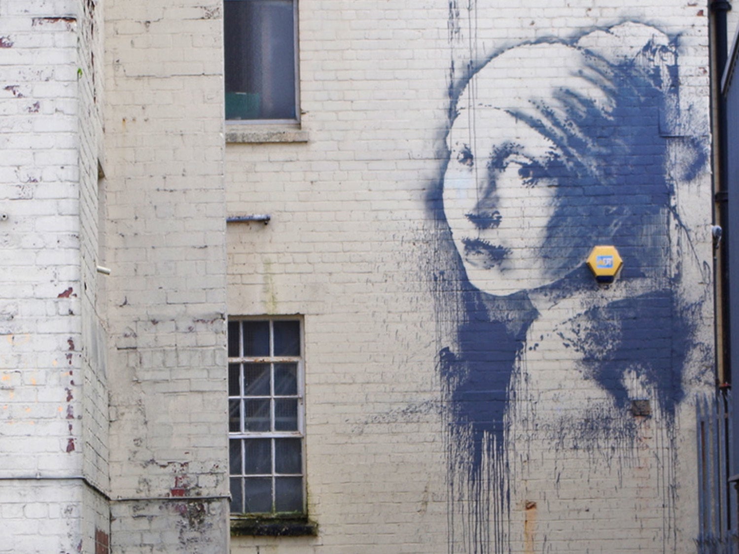 Banksy's 'The Girl with the Pierced Eardrum' in Bristol