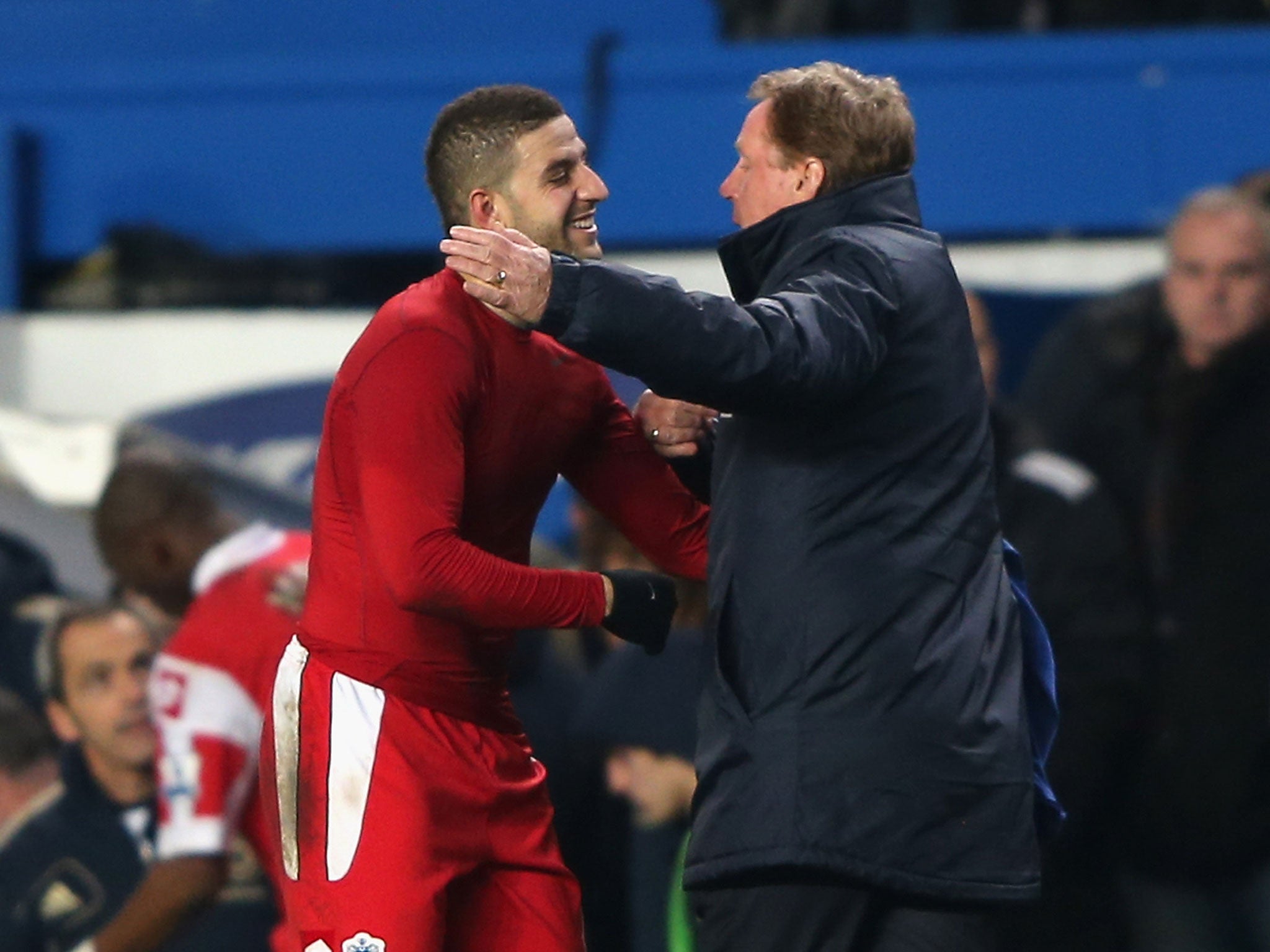 Adel Taarabt hugs Harry Redknapp in 2013