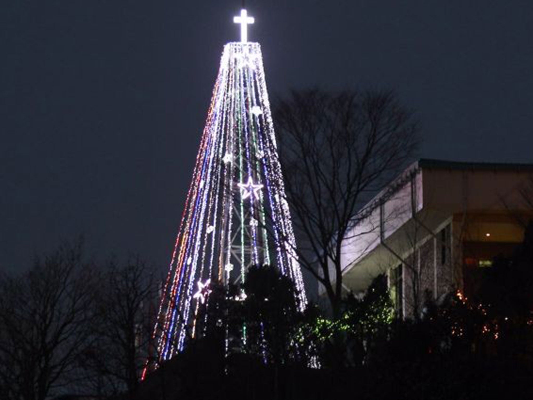 The giant steel Christmas tree lit up at the western mountain peak known as Aegibong in Gimpo, South Korea, in 2010