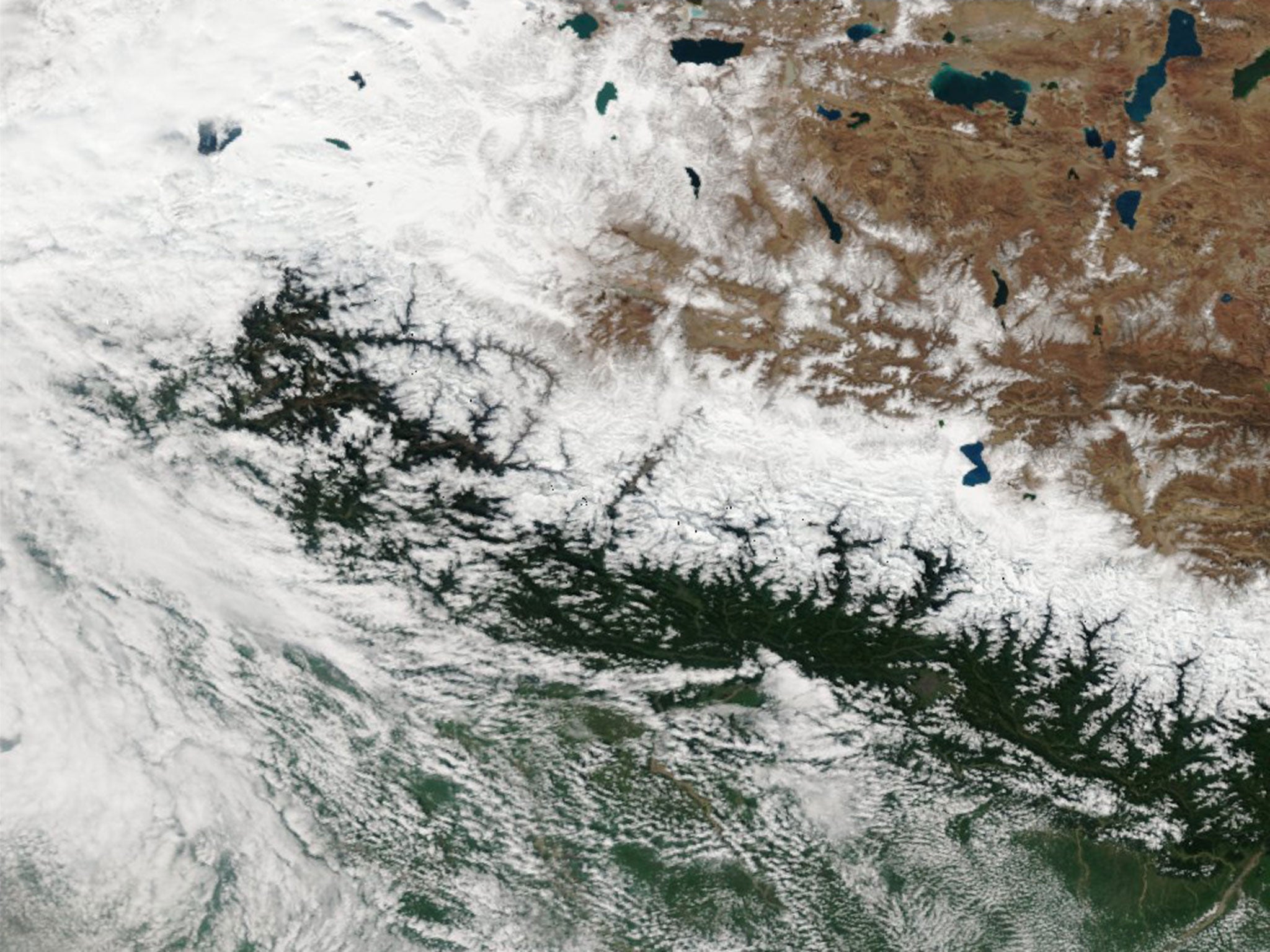 Satellite images shows the snow on the Annapurna Circuit in Nepal as Cyclone Hudhud made its way through the region on October 15