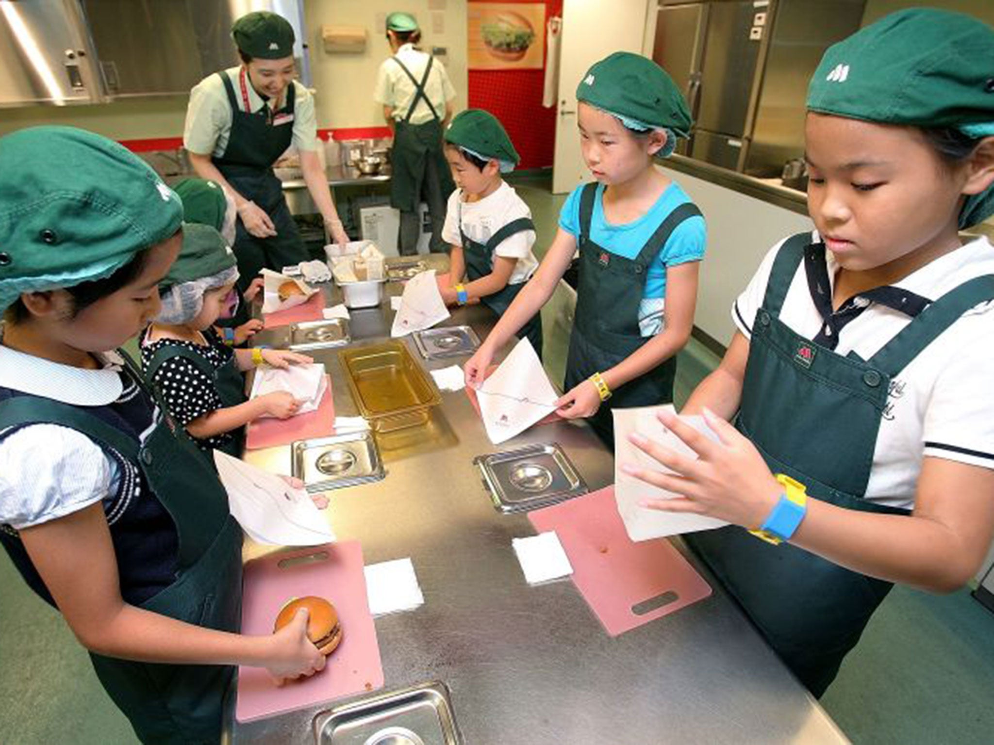 Children make burgers in the Japanese capital