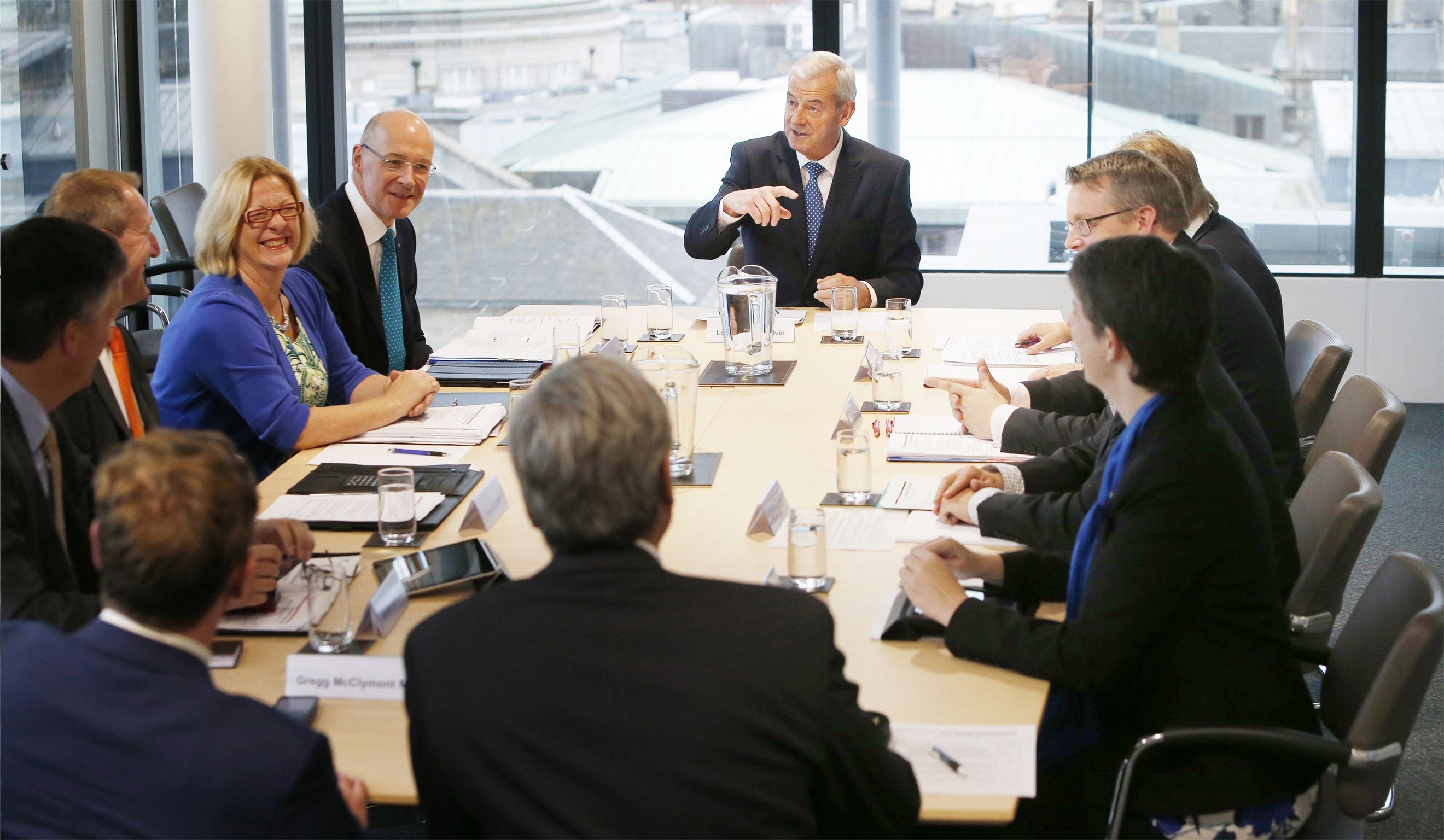 Lord Smith (back centre) Commission chair for the Smith Commission in Edinburgh, begins all-party talks aimed at reaching agreement on what new powers should be devolved to Scotland