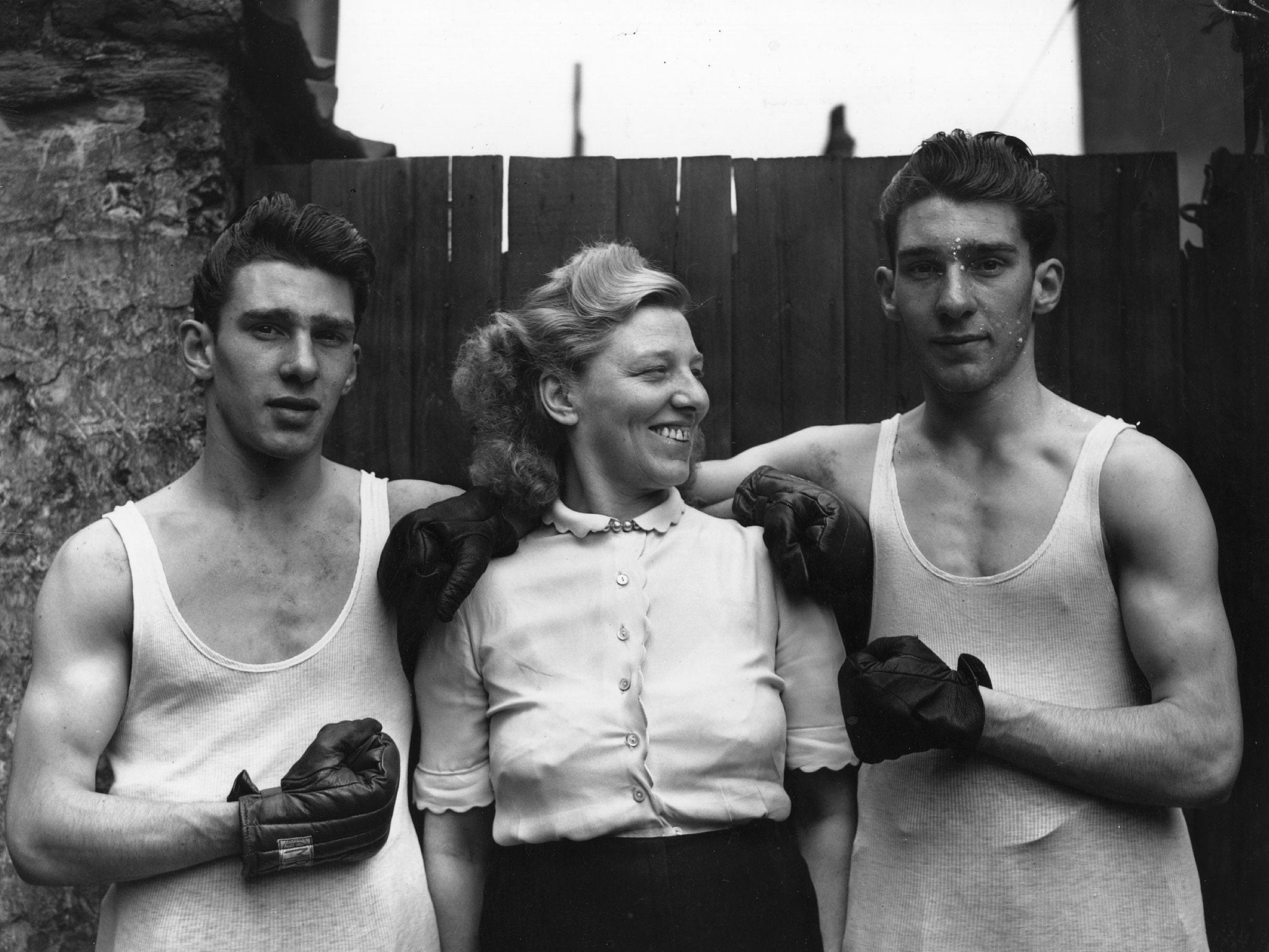 The notorious London gangsters Reggie (left) and Ronnie Kray, pictured here with their mother Violet, were rebuffed when they knocked on the boxing door