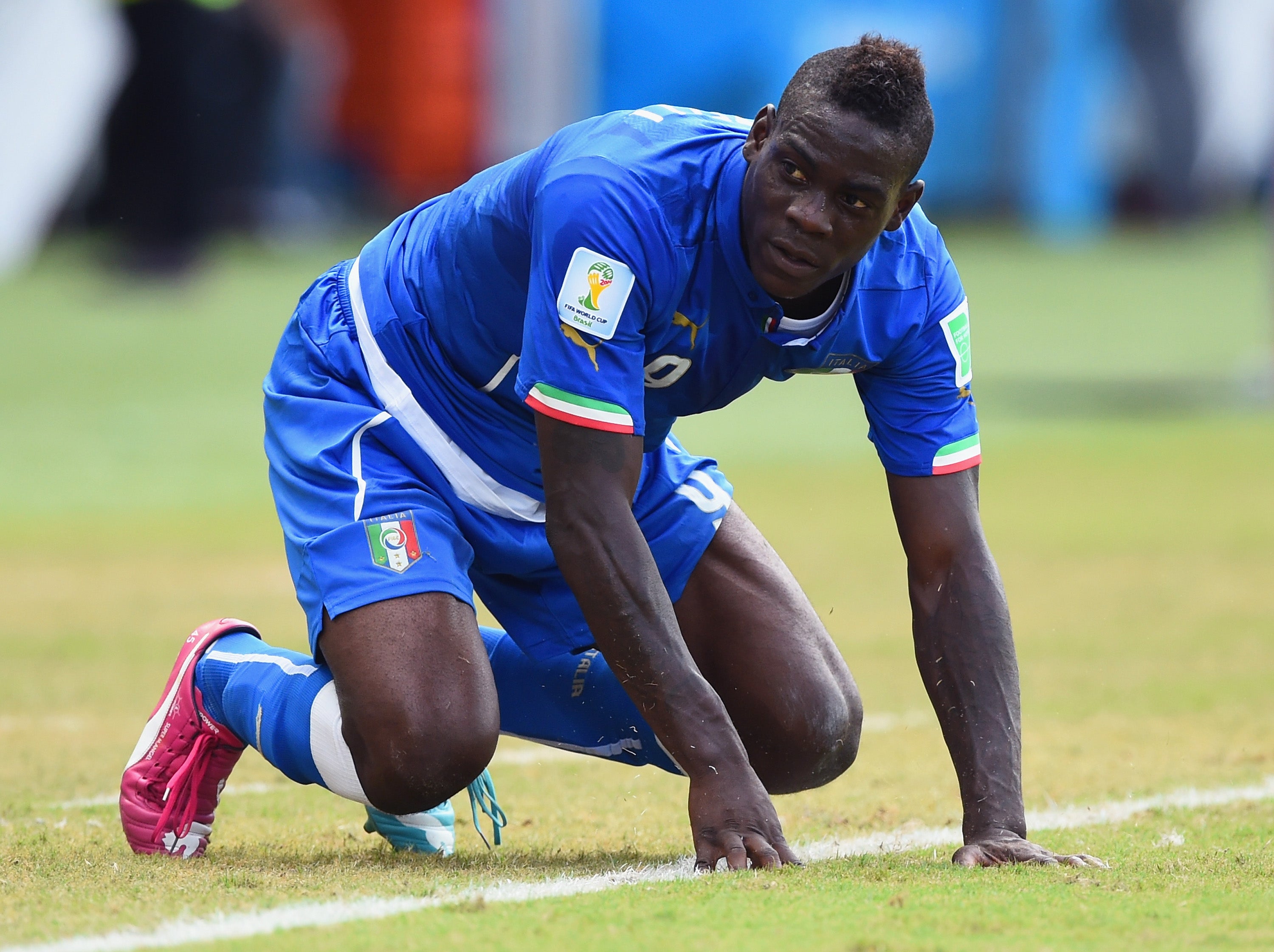 Mario Balotelli has been accused of 'threateningly' telling a woman to stop photographing his Ferrari