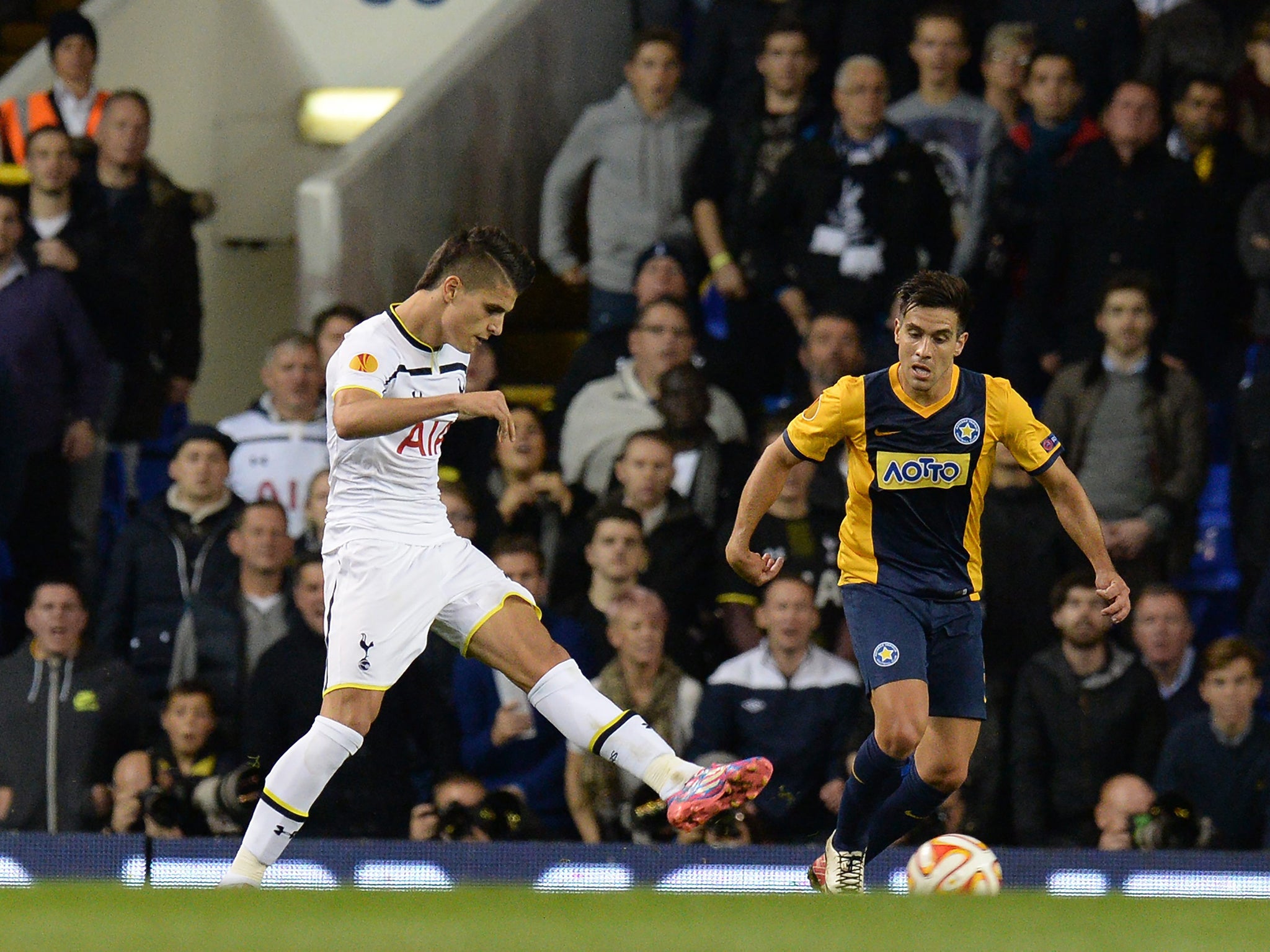 Erik Lamela doubles Tottenham’s lead with the first of his two goals, an audacious strike