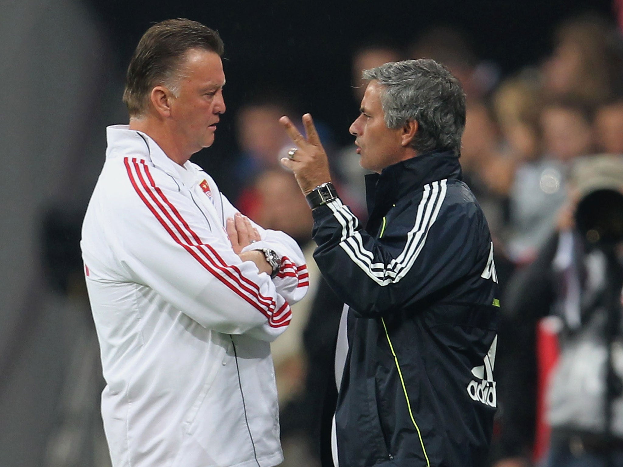 Jose Mourinho (right) chats with Louis van Gaal prior to the 201 Champions League final