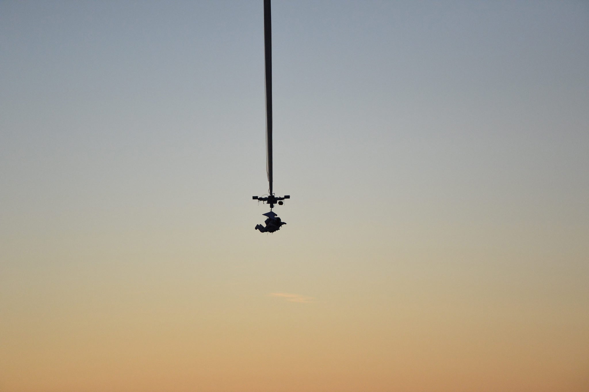 Alan Eustace is carried aloft by a balloon for his leap from the edge of space that broke the sound barrier and set several skydiving records over the southern New Mexico desert