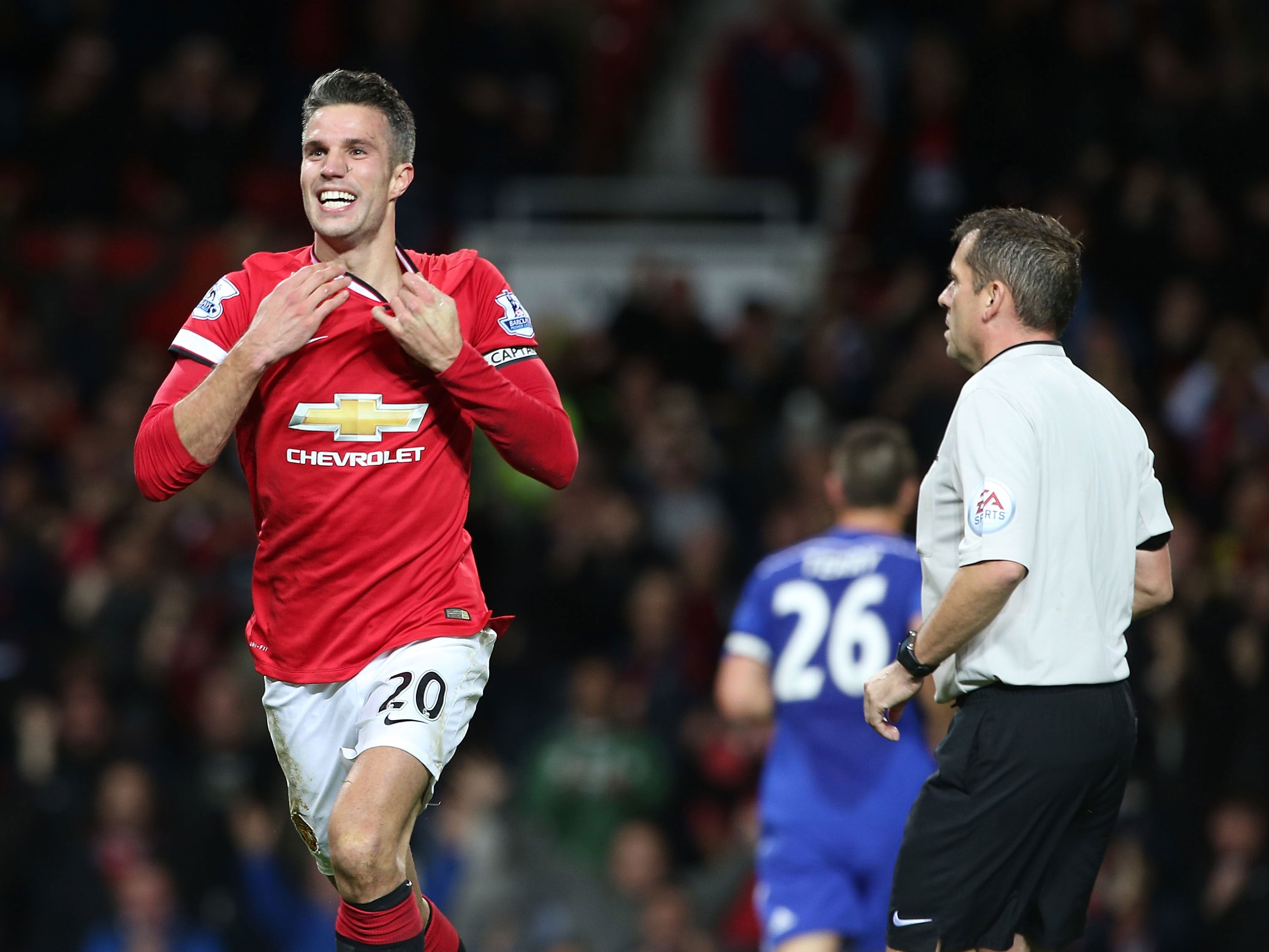 Robin van Persie celebrates his late equaliser