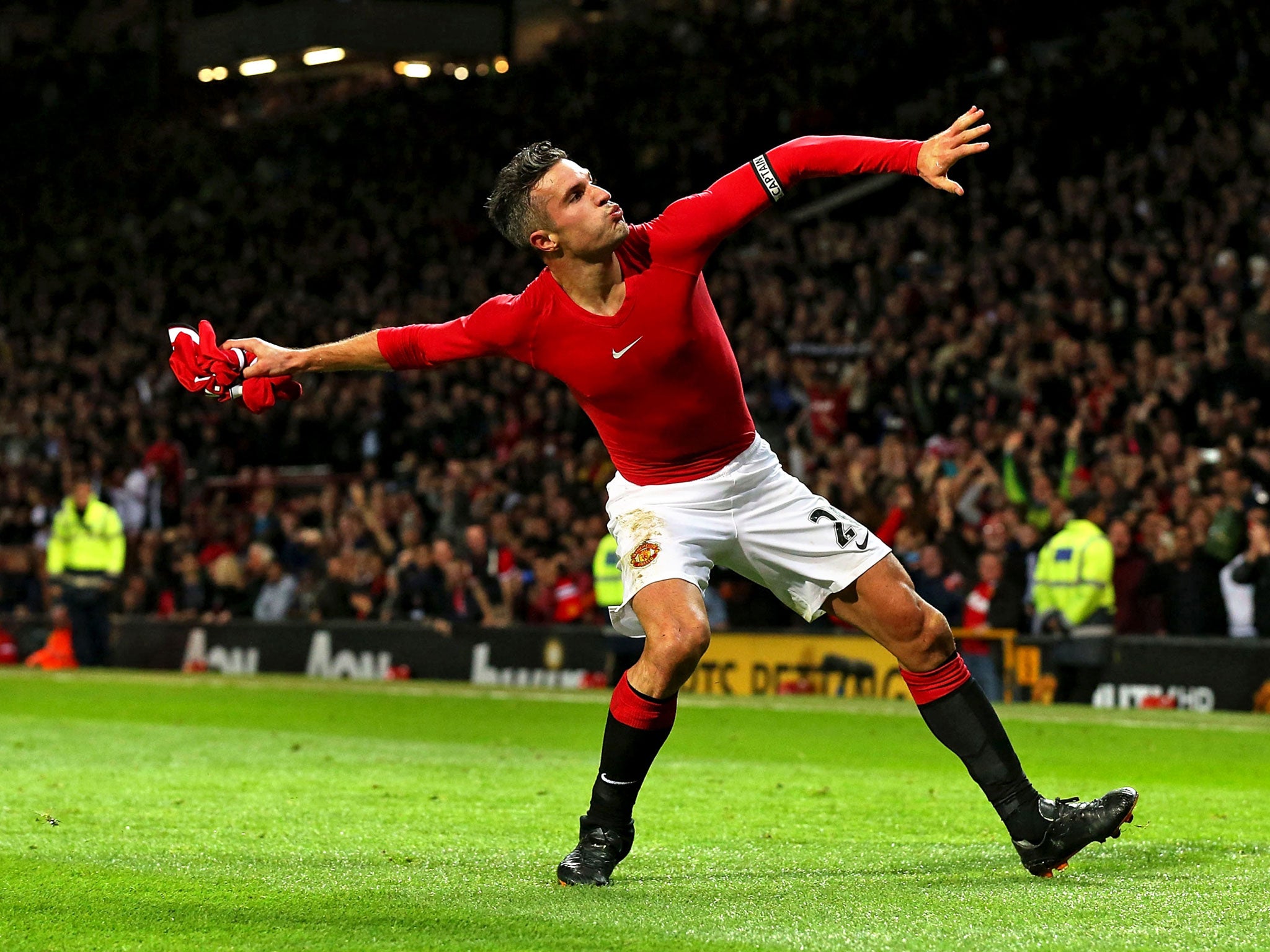 Robin van Persie celebrates his late equaliser