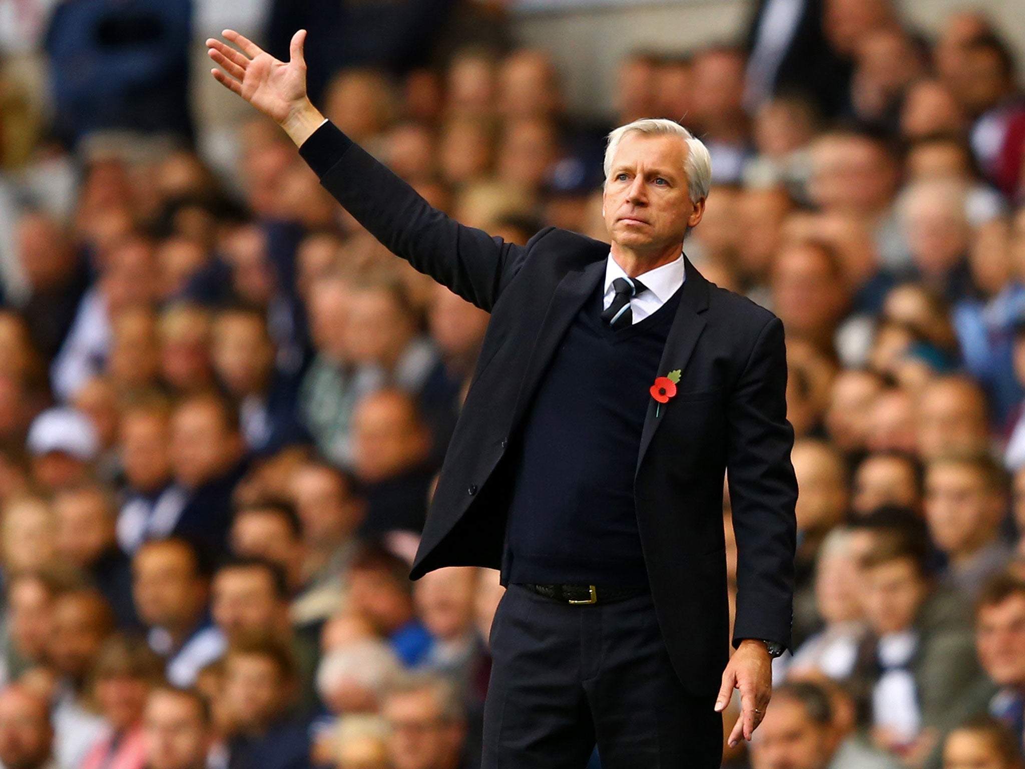 Alan Pardew celebrates victory over Tottenham