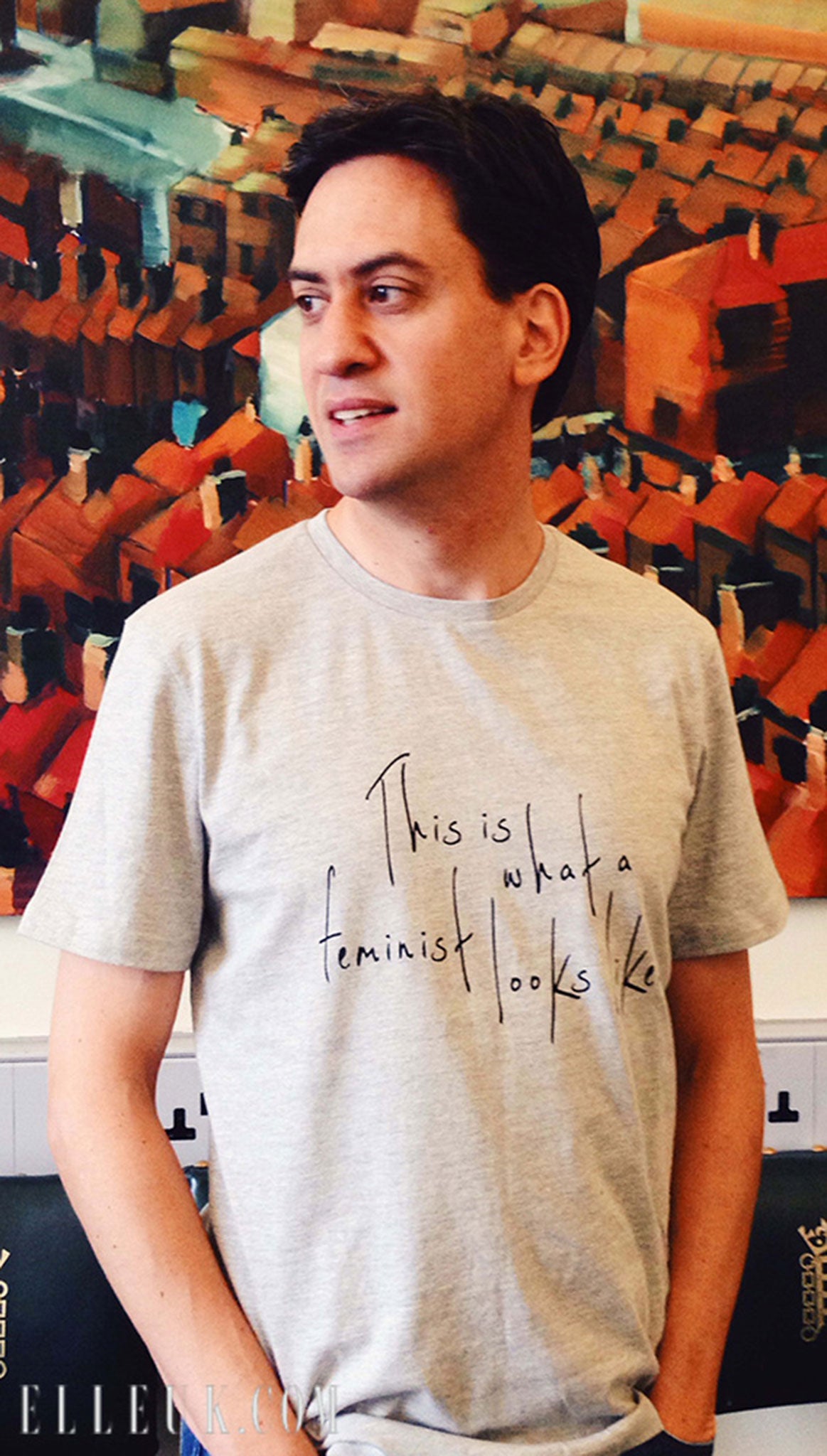 Ed Miliband poses in the Fawcett Society T-shirt