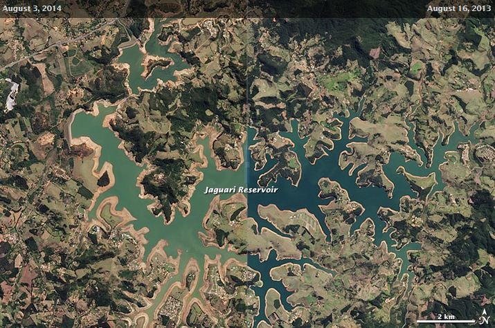 A satellite image taken of the Jaguari Reservoir in August 2013 (right) and a year later in 2014 (left)