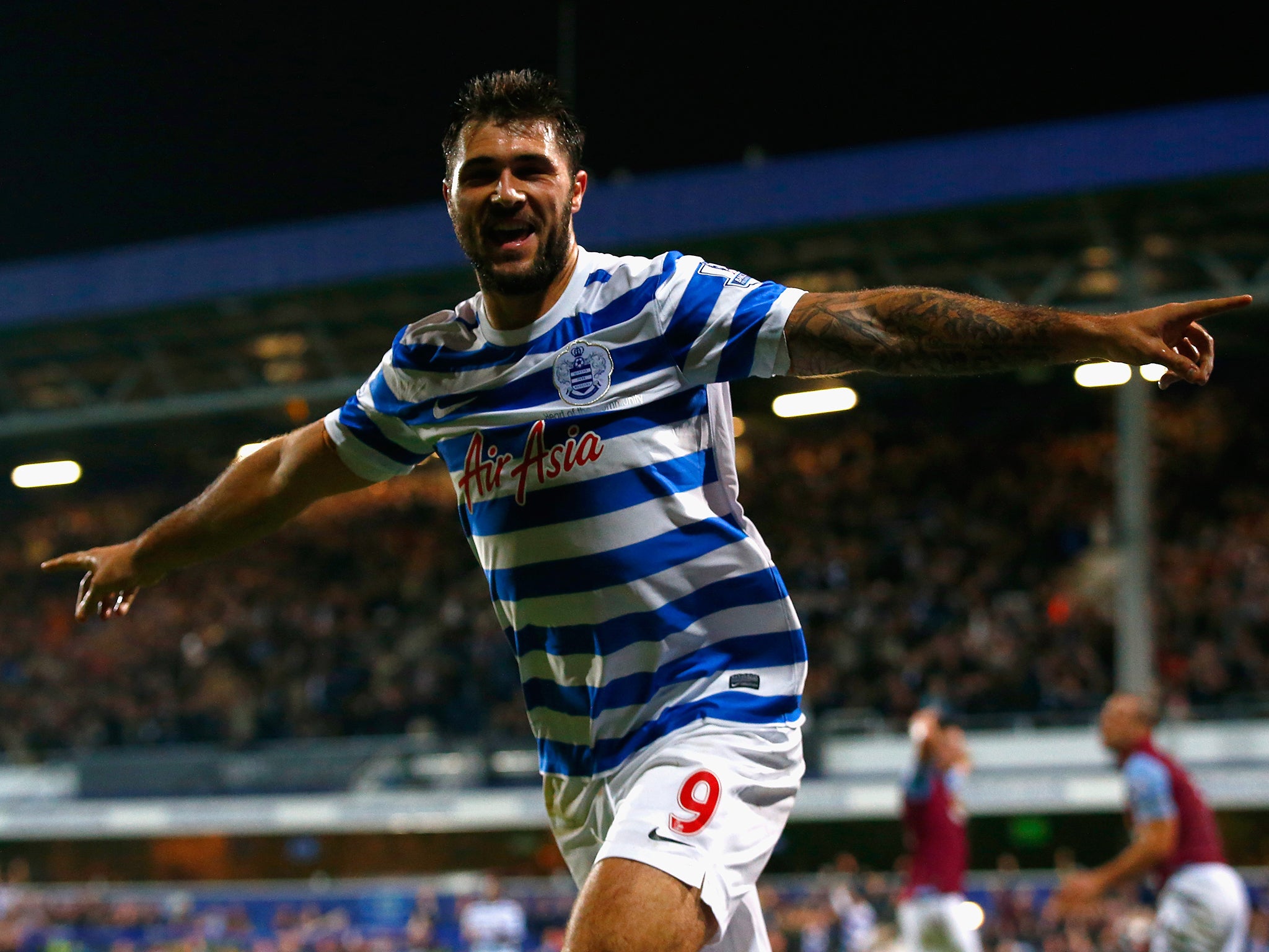 Charlie Austin of QPR celebrates scoring their second goal