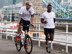 Ex-Royal Marine runs through London in the shape of a giant poppy