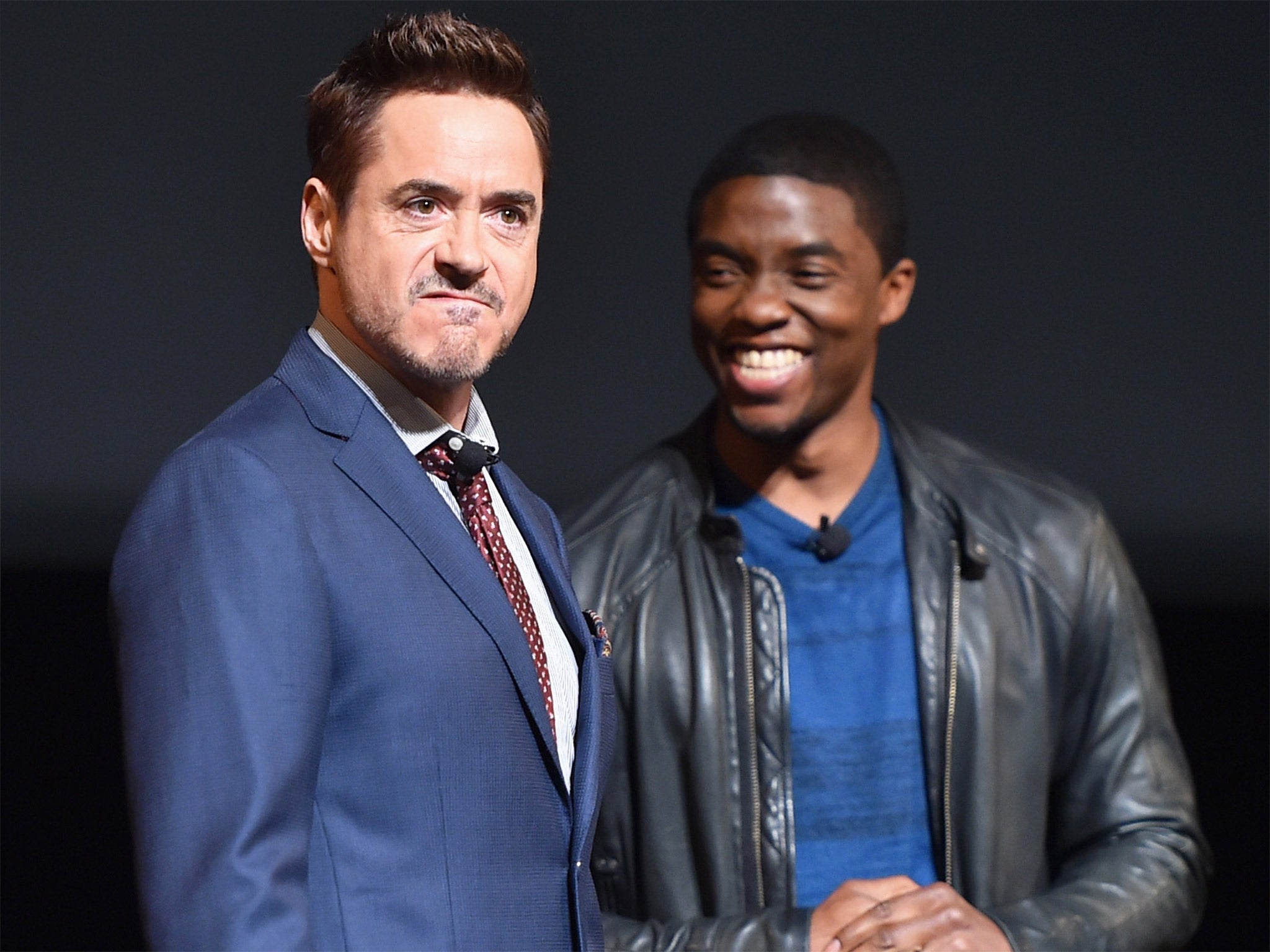 Robert Downey Jr with Chadwick Boseman - who it was announced will play Black Panther in a movie due for released in 2017 - onstage during Marvel Studios fan event at The El Capitan Theatre in Los Angeles, California