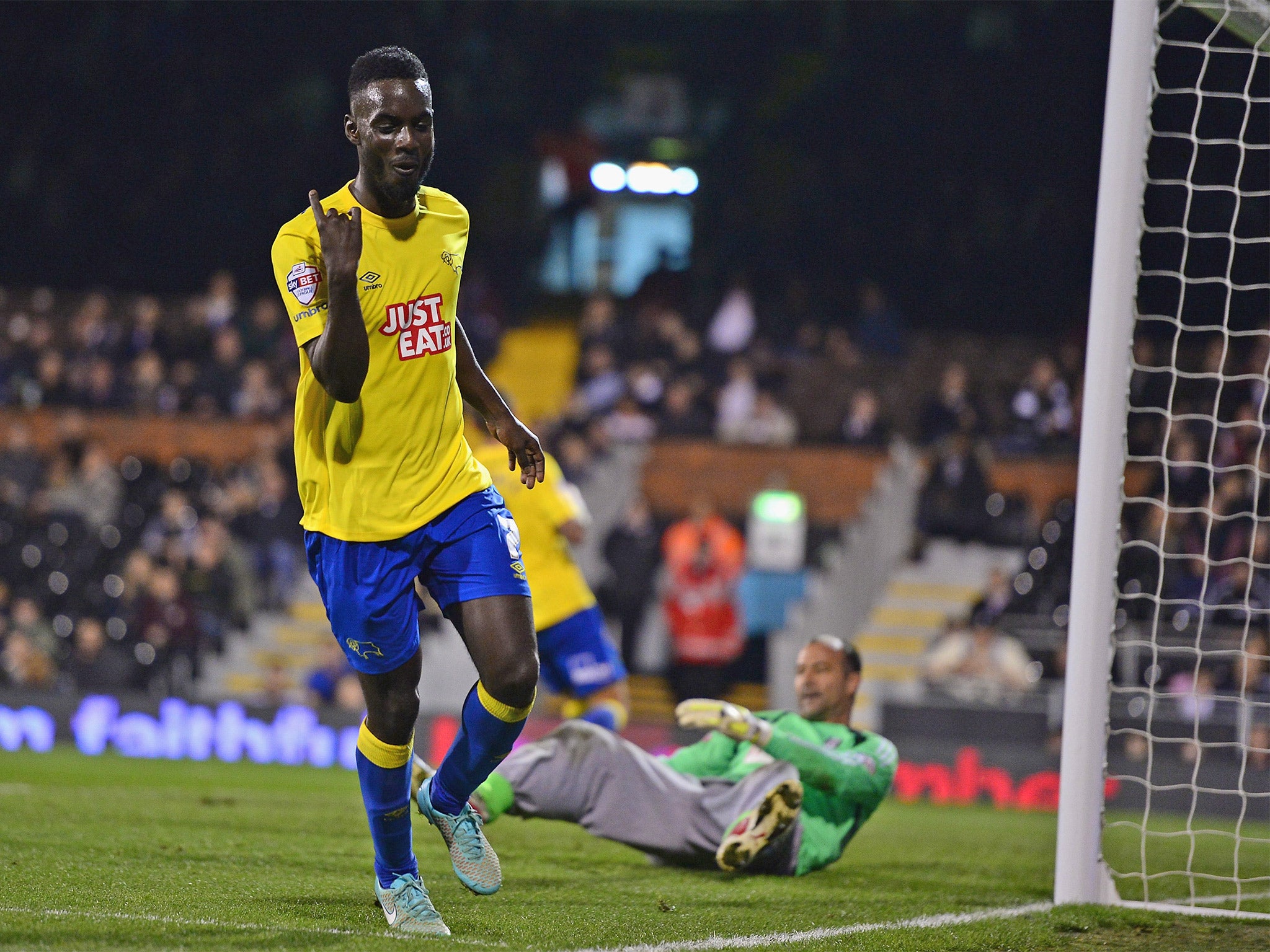 Derby striker Simon Dawkins celebrates his second goal against Fulham