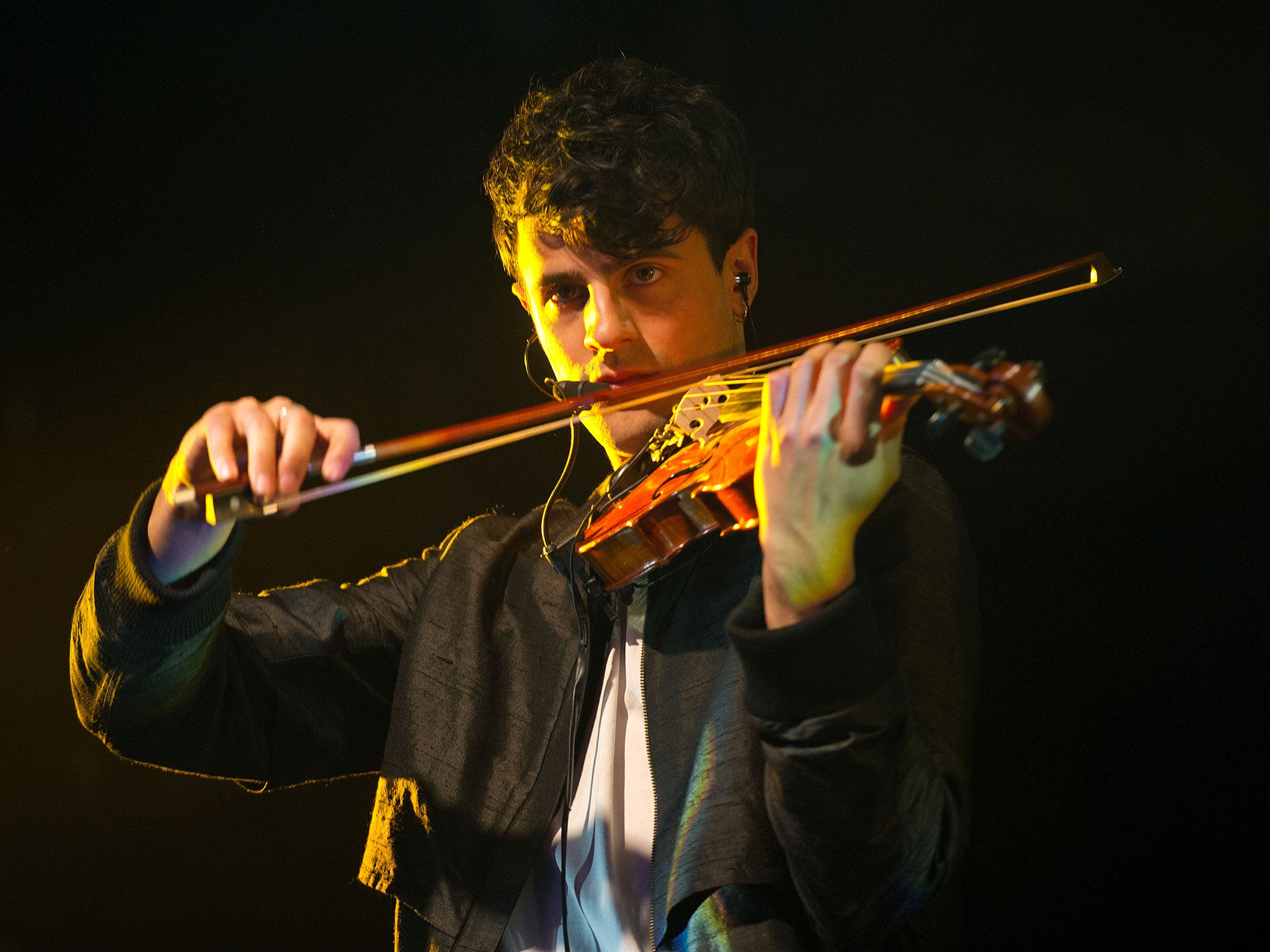 Milan Neil Amin-Smith plays violin for Clean Bandit