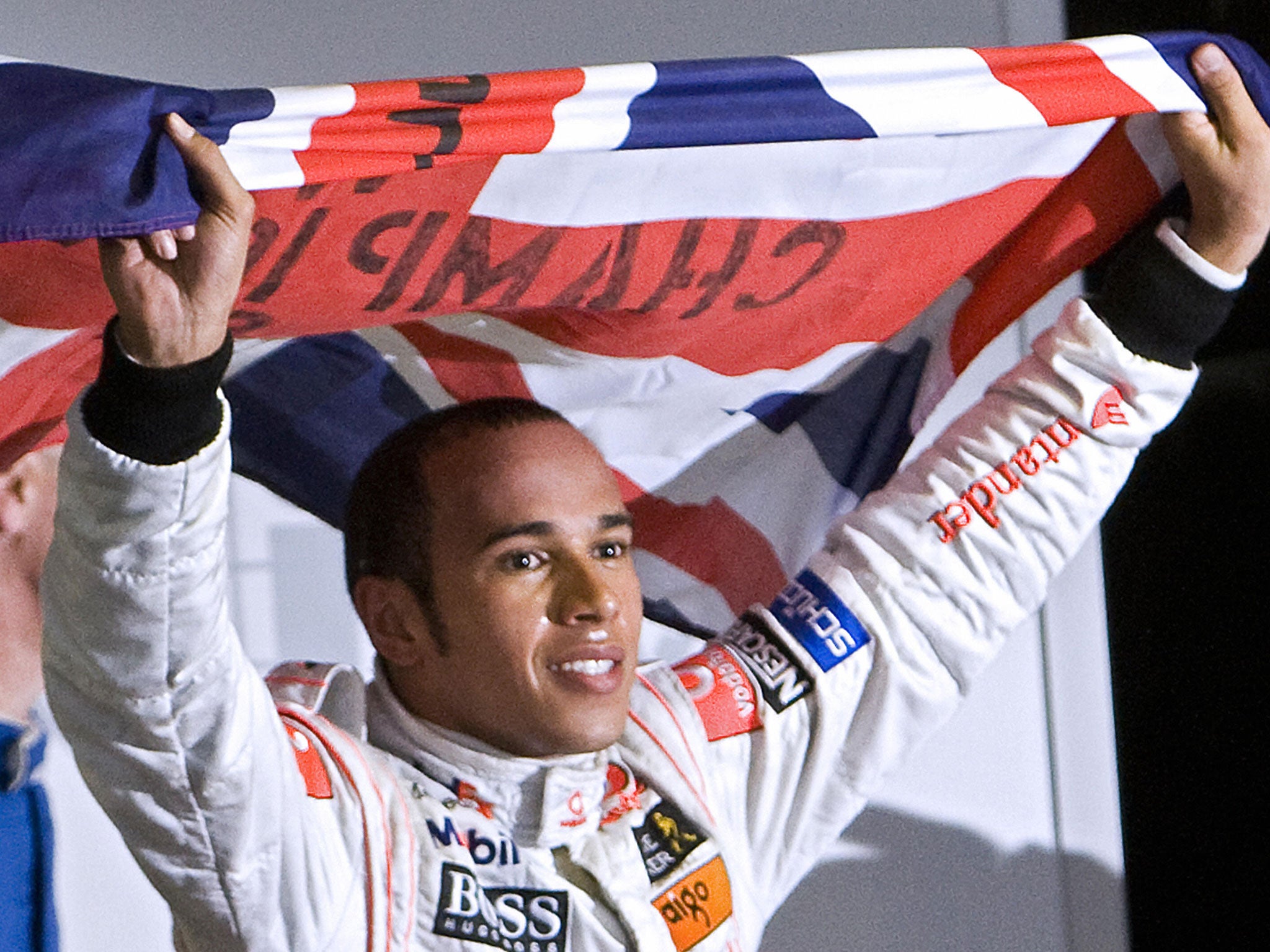 Hamilton celebrates winning the Drivers' Championship in 2008