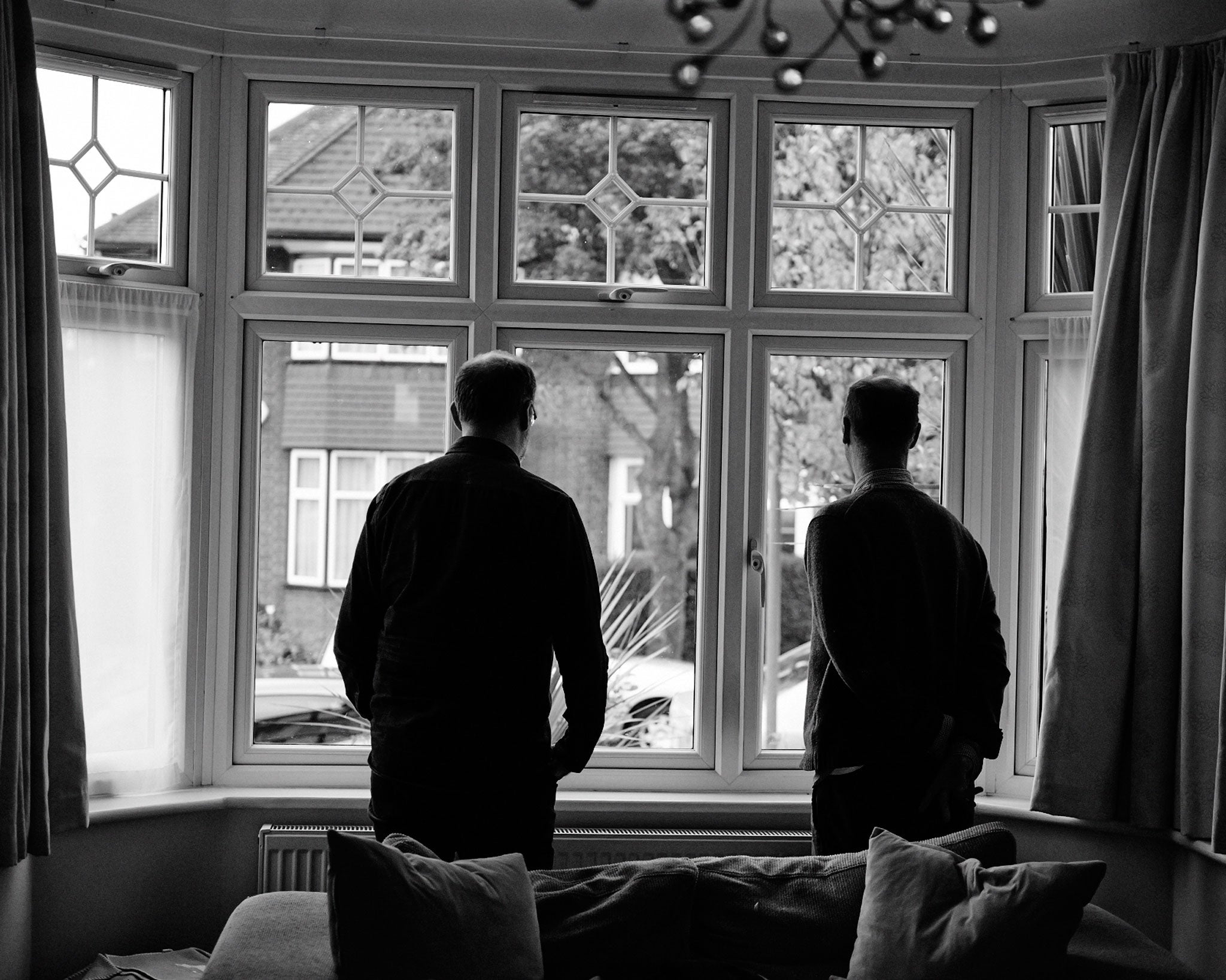 Bain and Armstrong take in the view in the former's living room