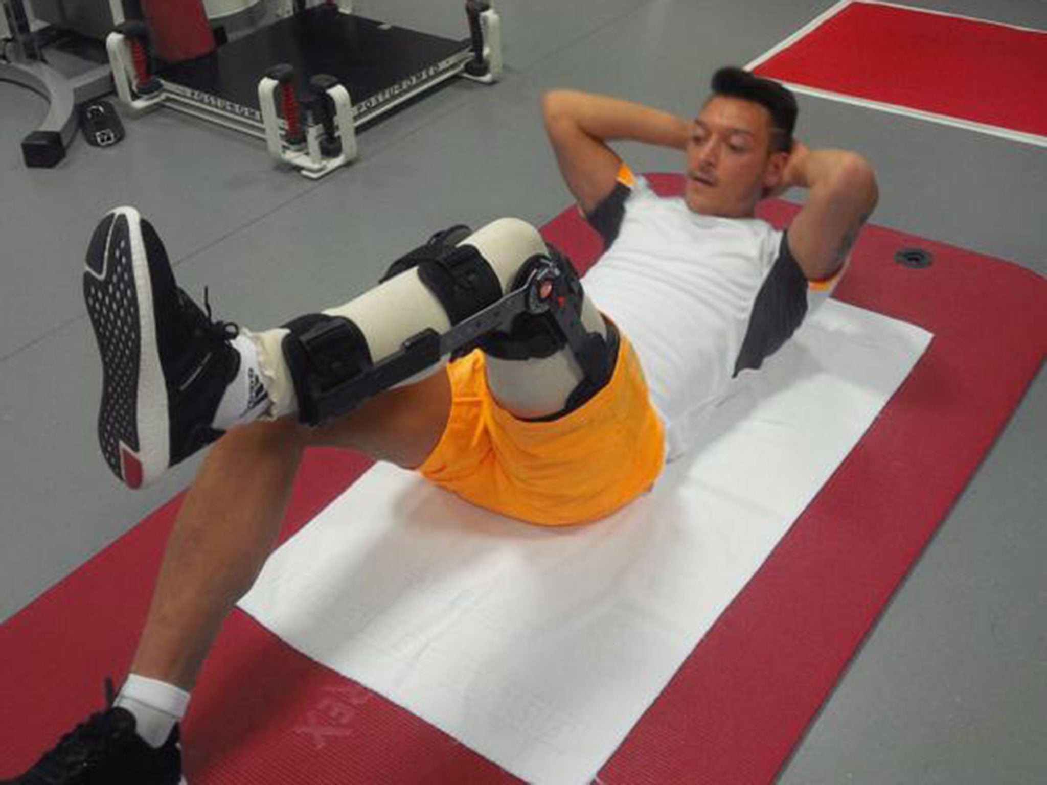 Özil posted this picture on his Twitter account to update fans on his injury status