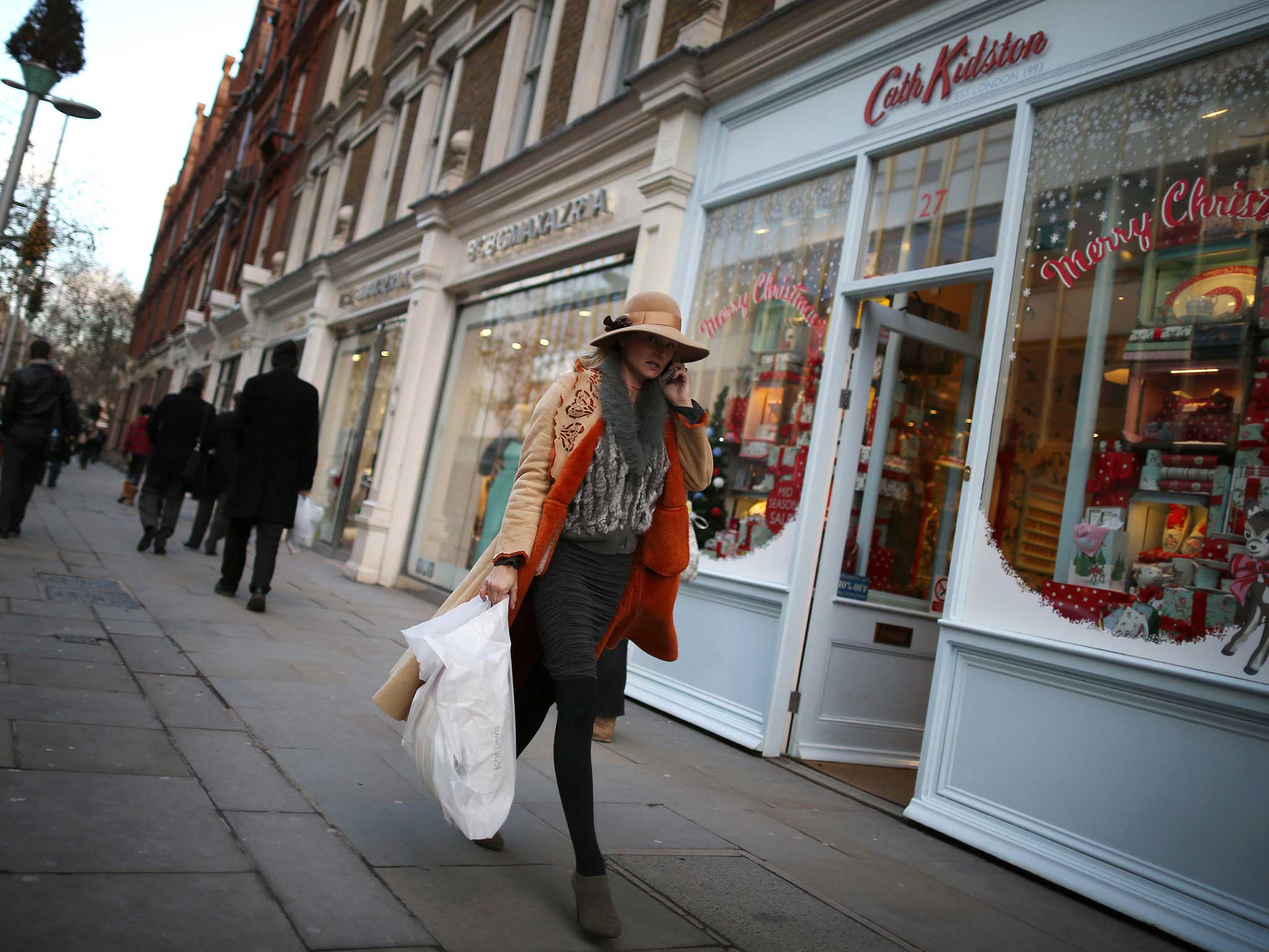 A shopper on the Kings Road where a garage has just sold for half a million pounds