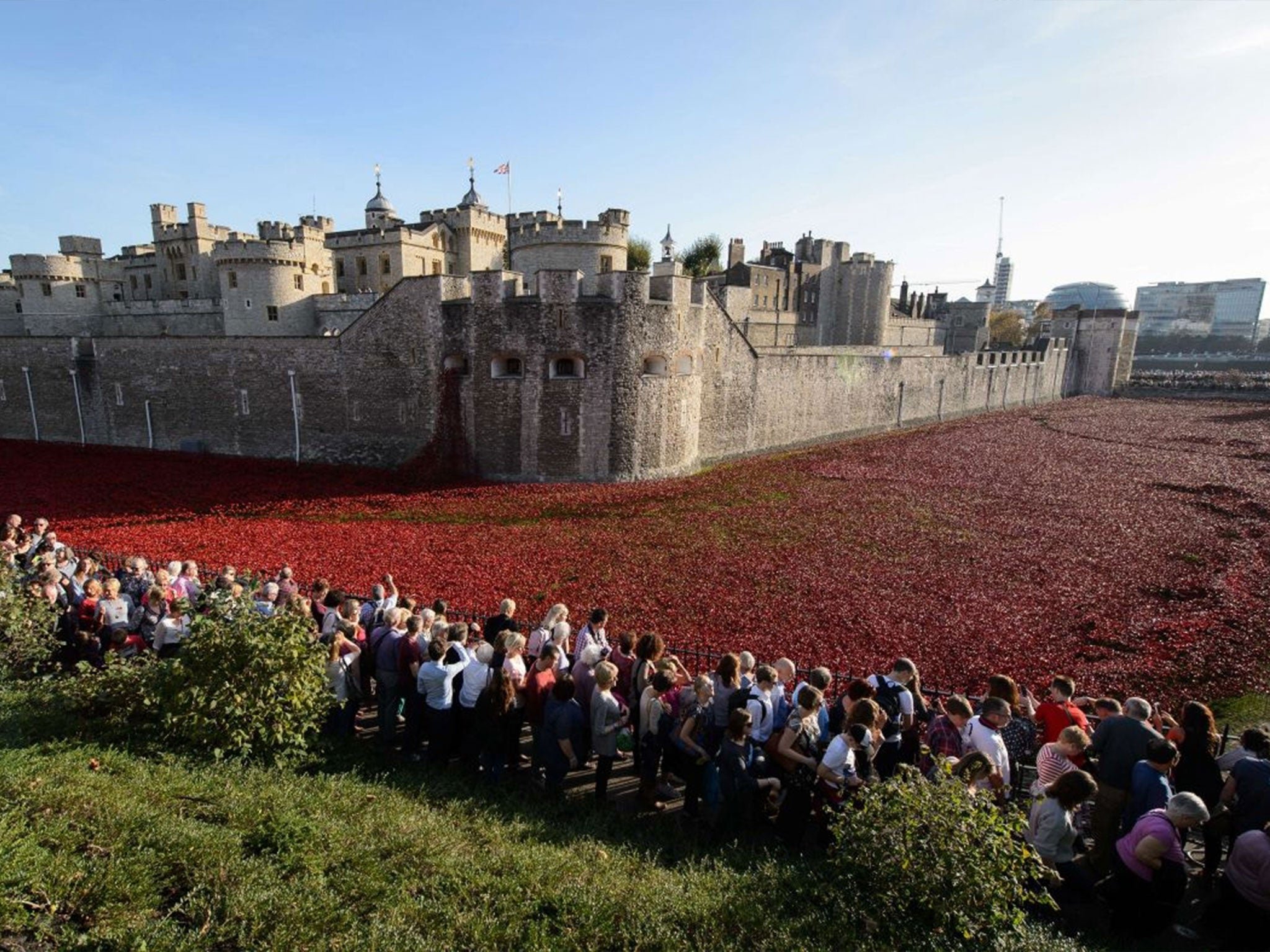 Visitors view the "Blood Swept Lands and Seas of Red" installation