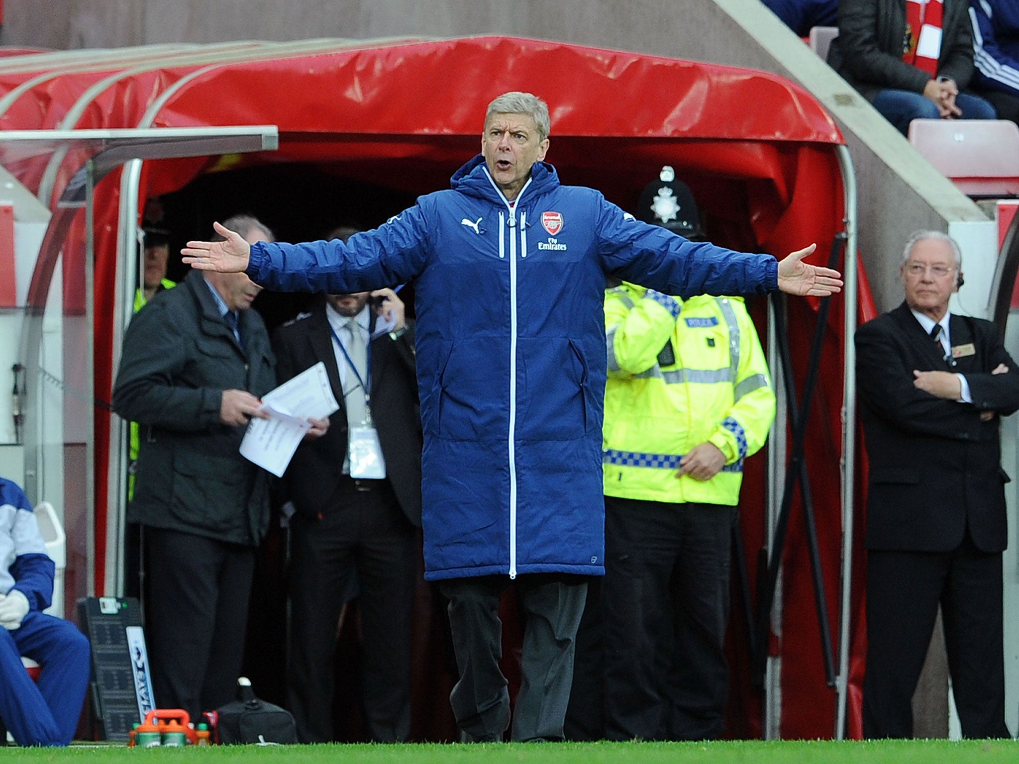 Arsene Wenger gestures during the 2-0 win over Sunderland