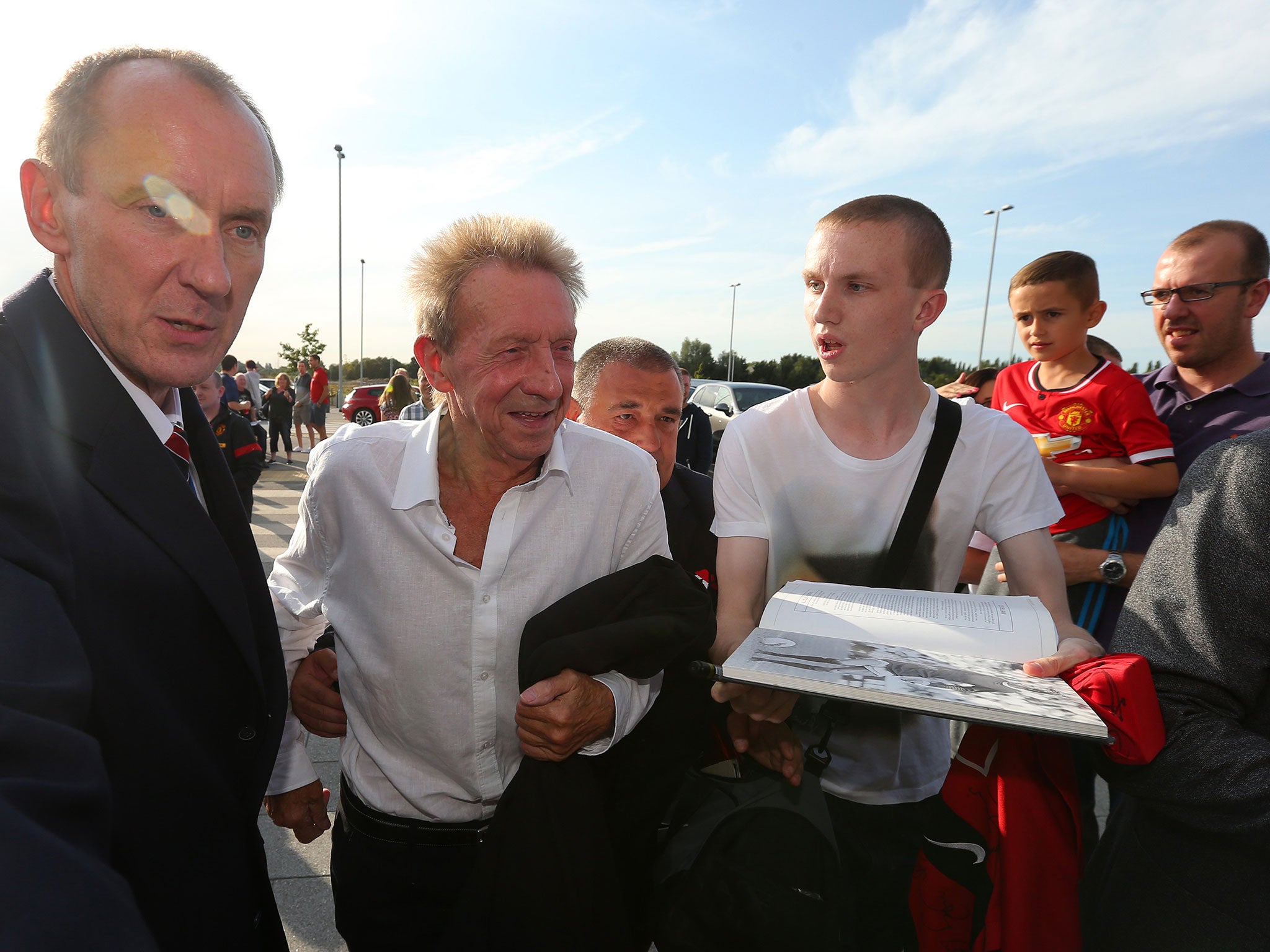 Denis Law arrives at Old Trafford