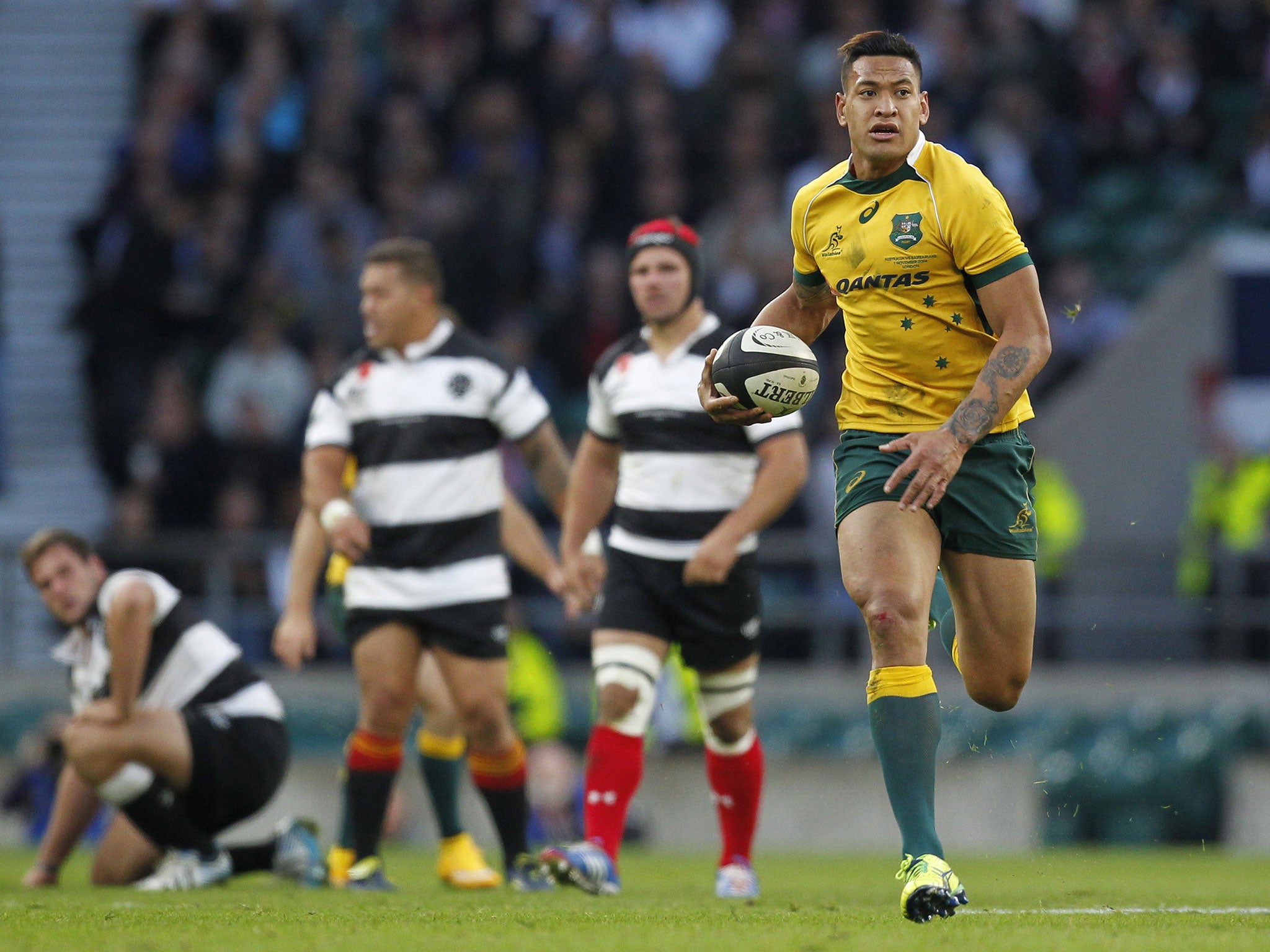 Israel Folau sprints away with the ball