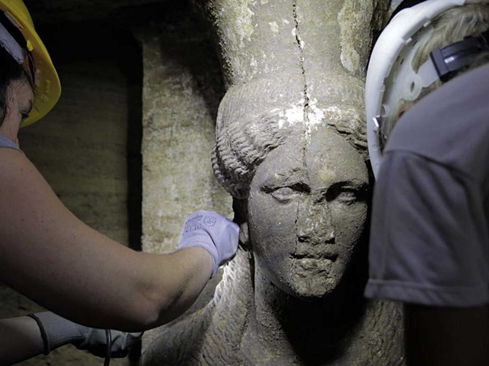 Archaeologists have found female marble statues standing more than 2m high, wearing tunics with rich folds