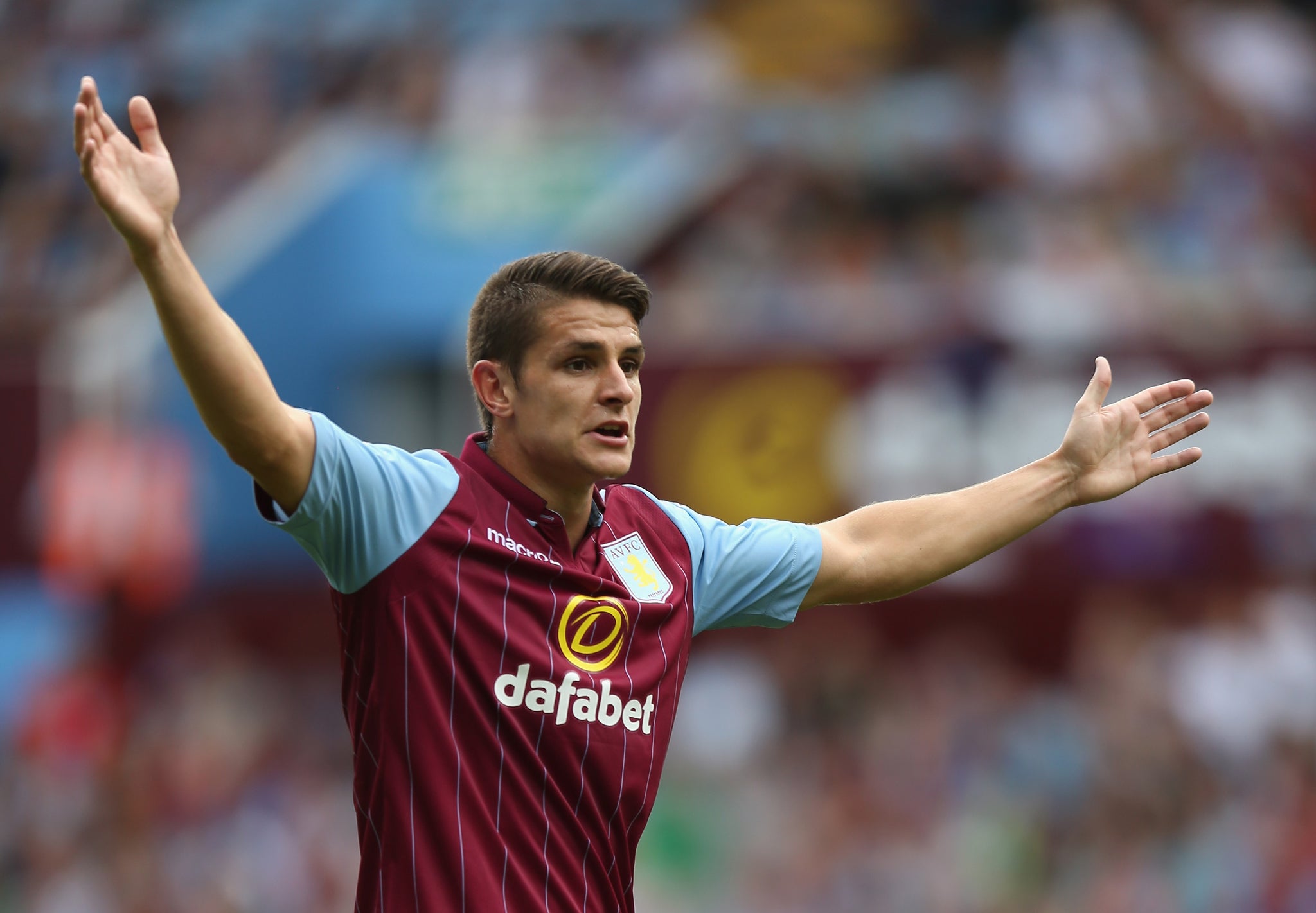 Ashley Westwood in action for Aston Villa