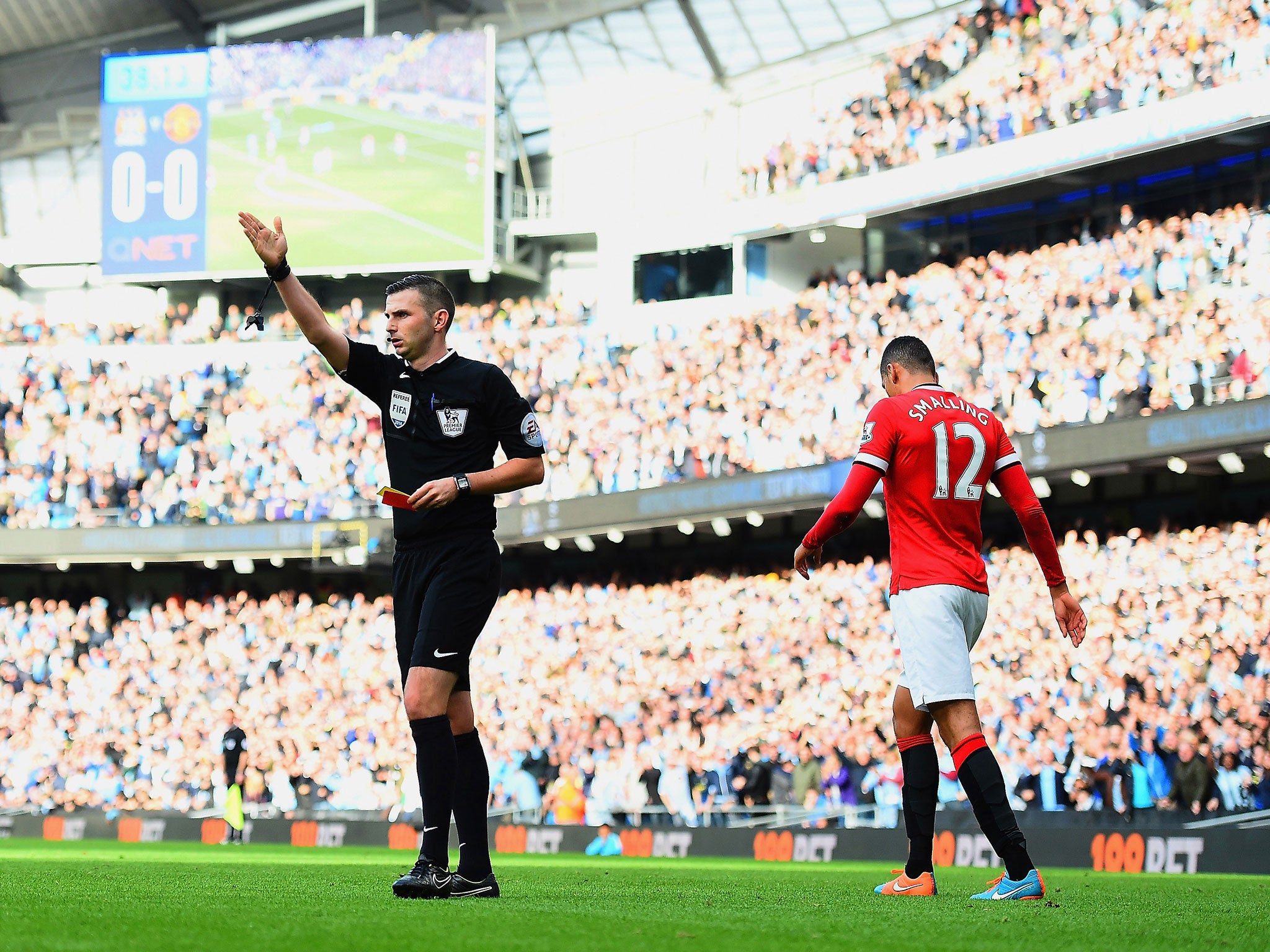 Smalling is given a red card during United's 1-0 defeat to City