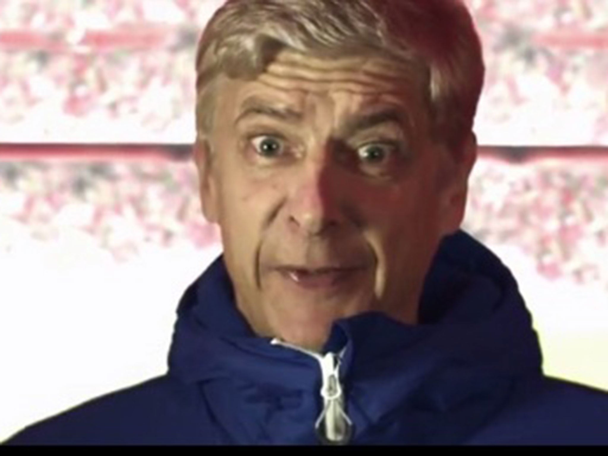 Arsene Wenger advertises his new coat