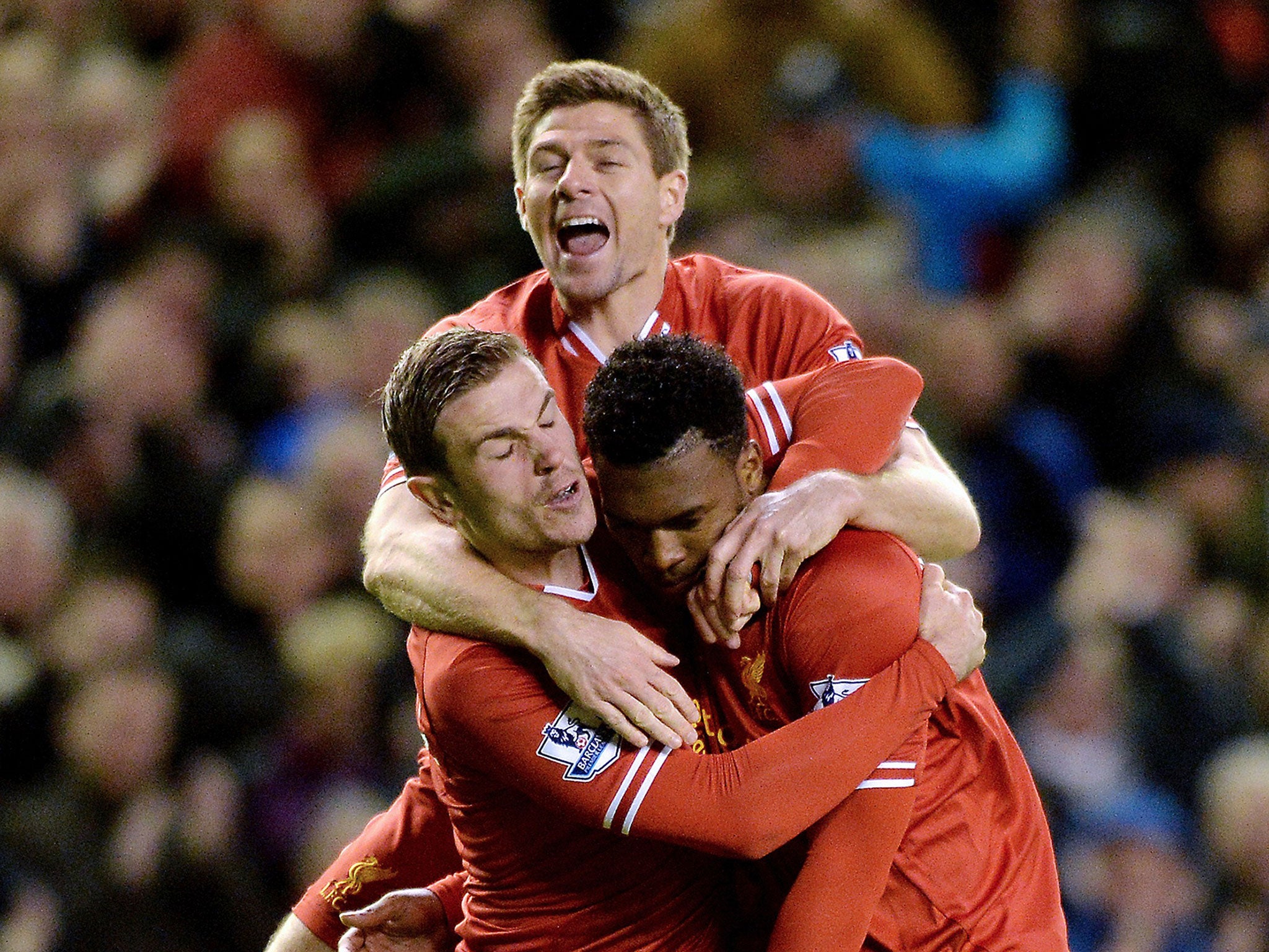 Henderson, Gerrard and Sturridge celebrate