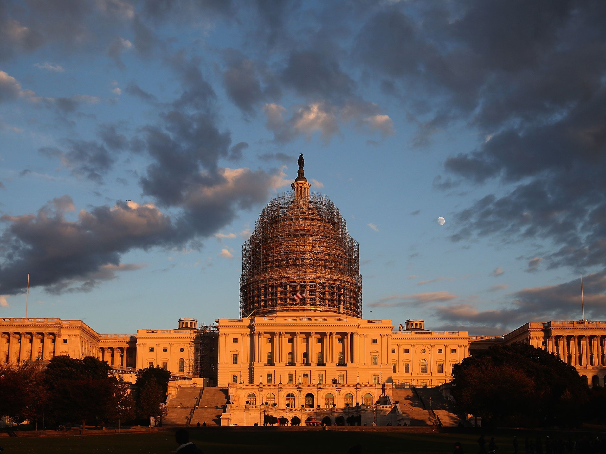 The afternoon sun hits the U.S. Capitol on the eve of the nation's mid-term elections, November 3, 2014 in Washington, DC. On November 4, Americans will head to the polls to cast their vote in the mid-term elections with the control of the U.S. Senate in