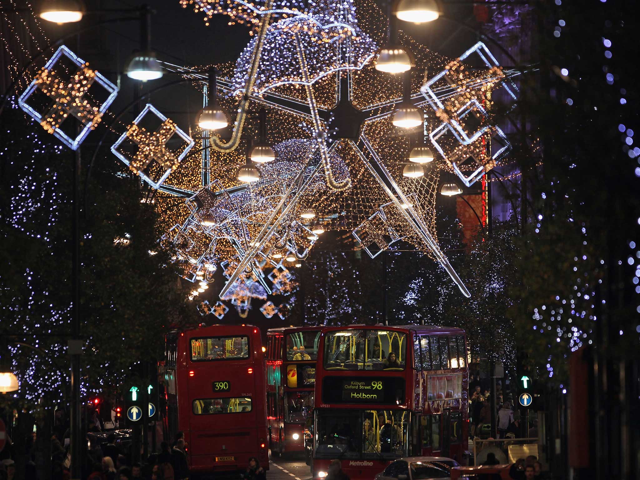 Christmas tree lights decorate a London street: A landmark ruling means British workers may be able to claim back pay on their holidays