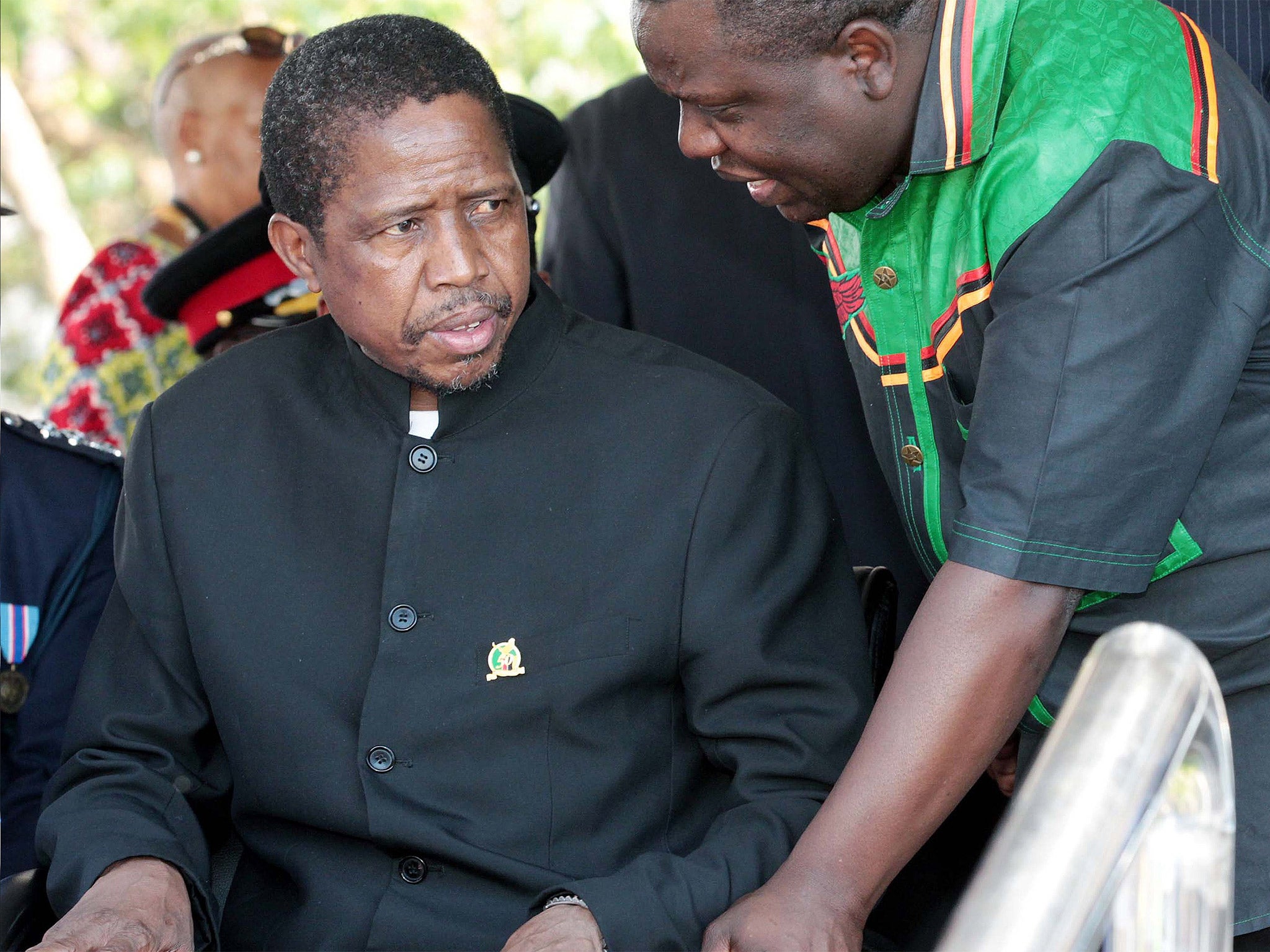 Edgar Lungu, left, had accused Guy Scott of 'insulting our culture'