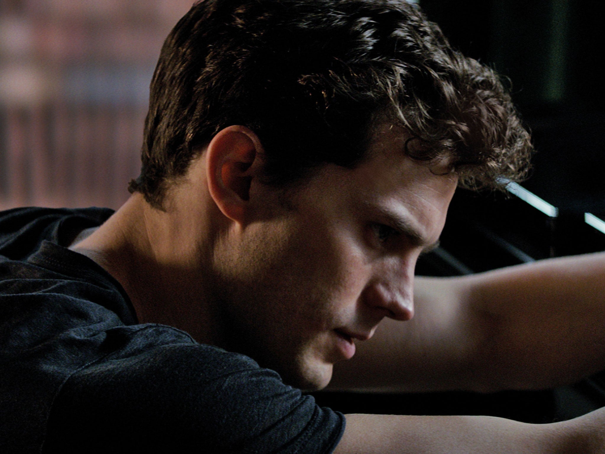 Jamie Dornan as BDSM-loving billionaire Christian Grey in Fifty Shades of Grey