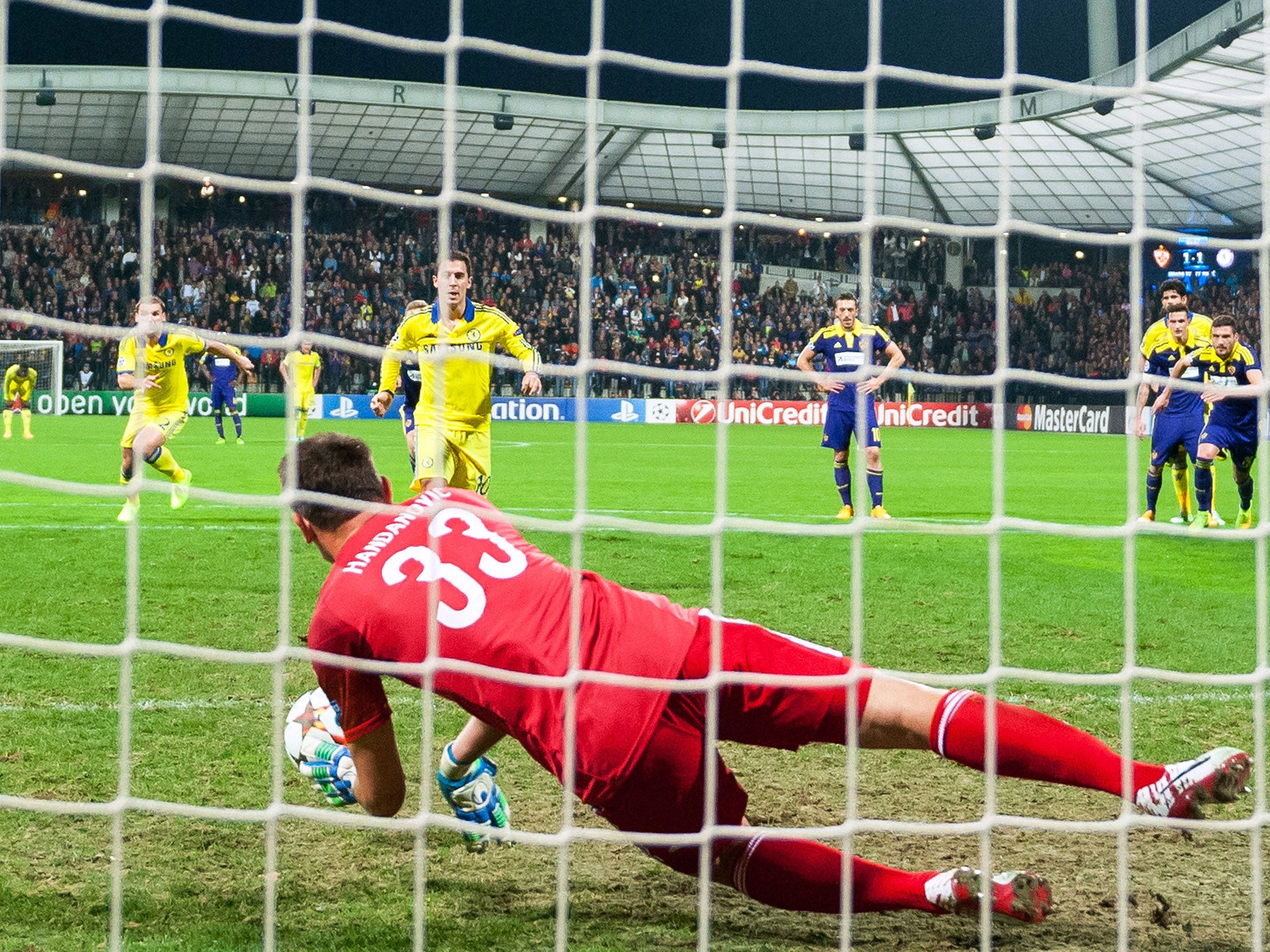 Eden Hazard sees his late penalty saved