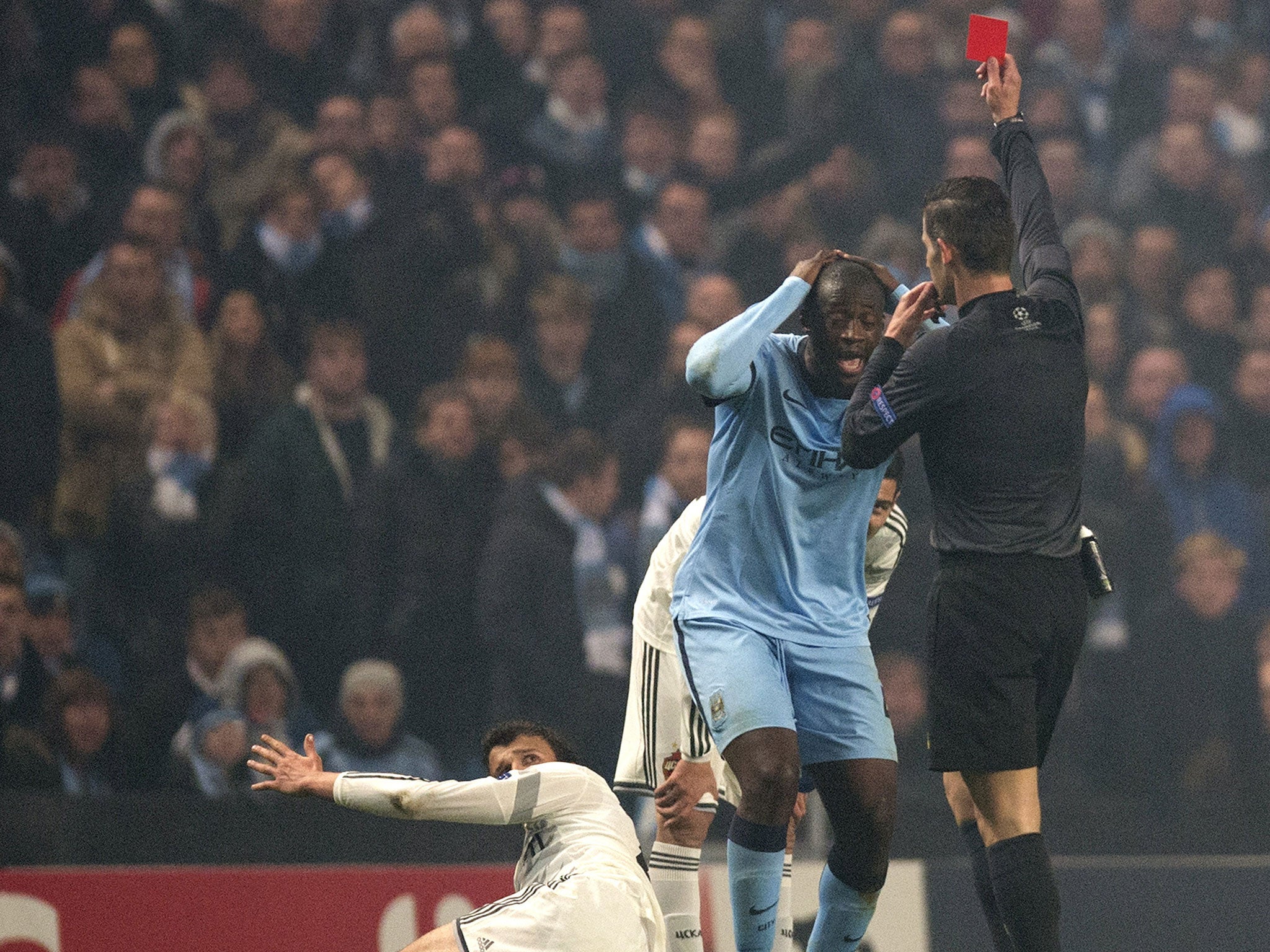 Toure is shown a red card in the 2-1 defeat to CSKA Moscow