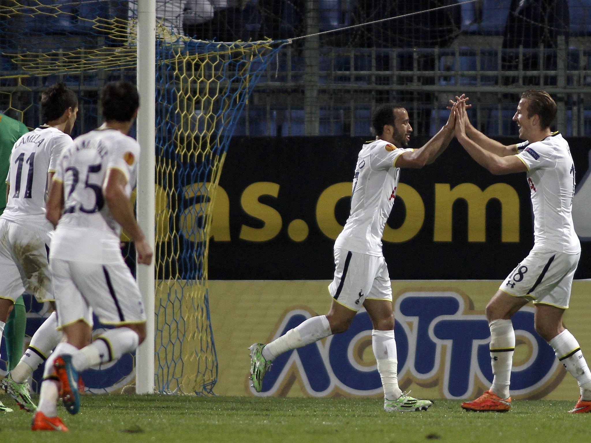 Andros Townsend celebrates with Harry Kane after the former scores against Asteras Tripolis