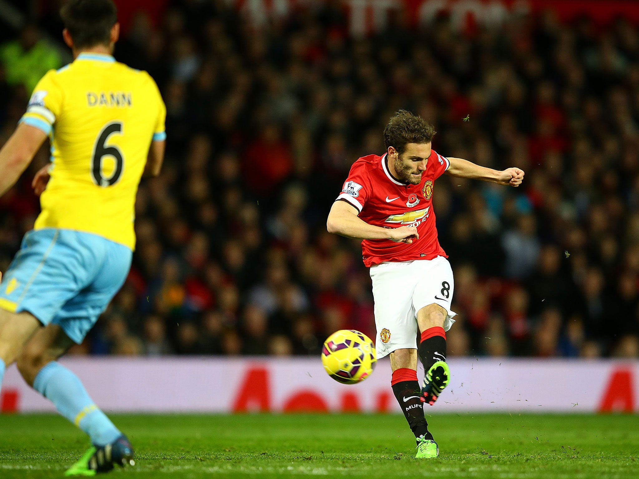 Mata fires in a 25-yard strike that took a deflection