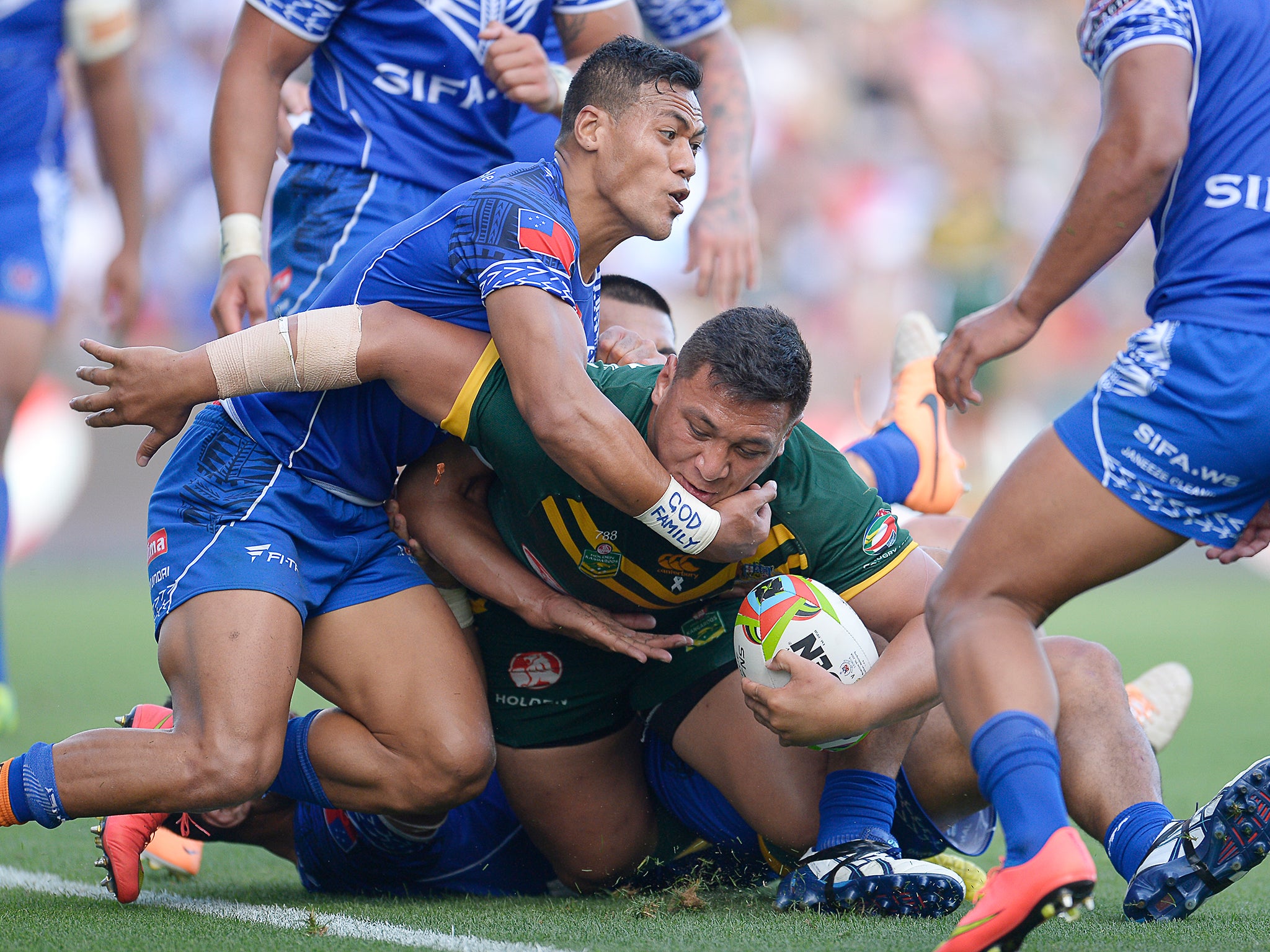 Josh Papalii of Australia drives towards the line to score a try