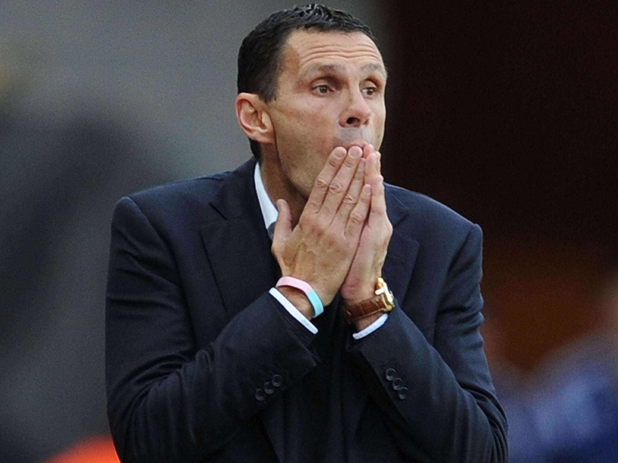 Gus Poyet reacts on the touchline