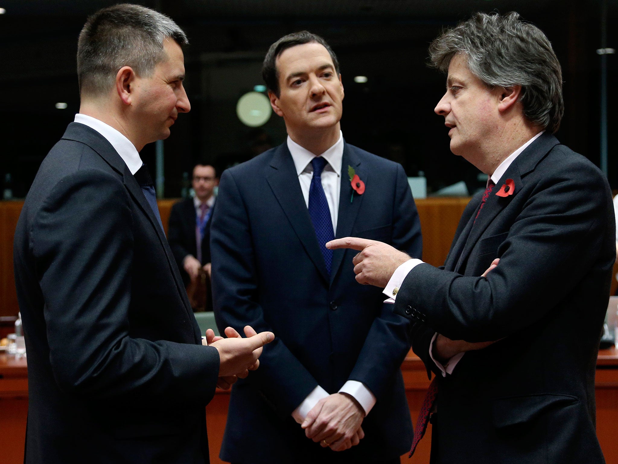 George Osborne with Mateusz Szczurek, Polish finance minister, and Lord Hill, European Financial Commissioner, in Brussels