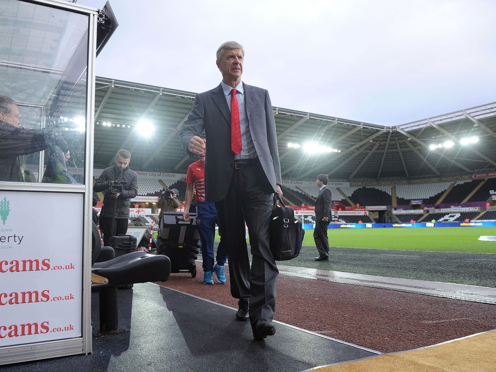 Arsene Wenger arrives at the Liberty Stadium