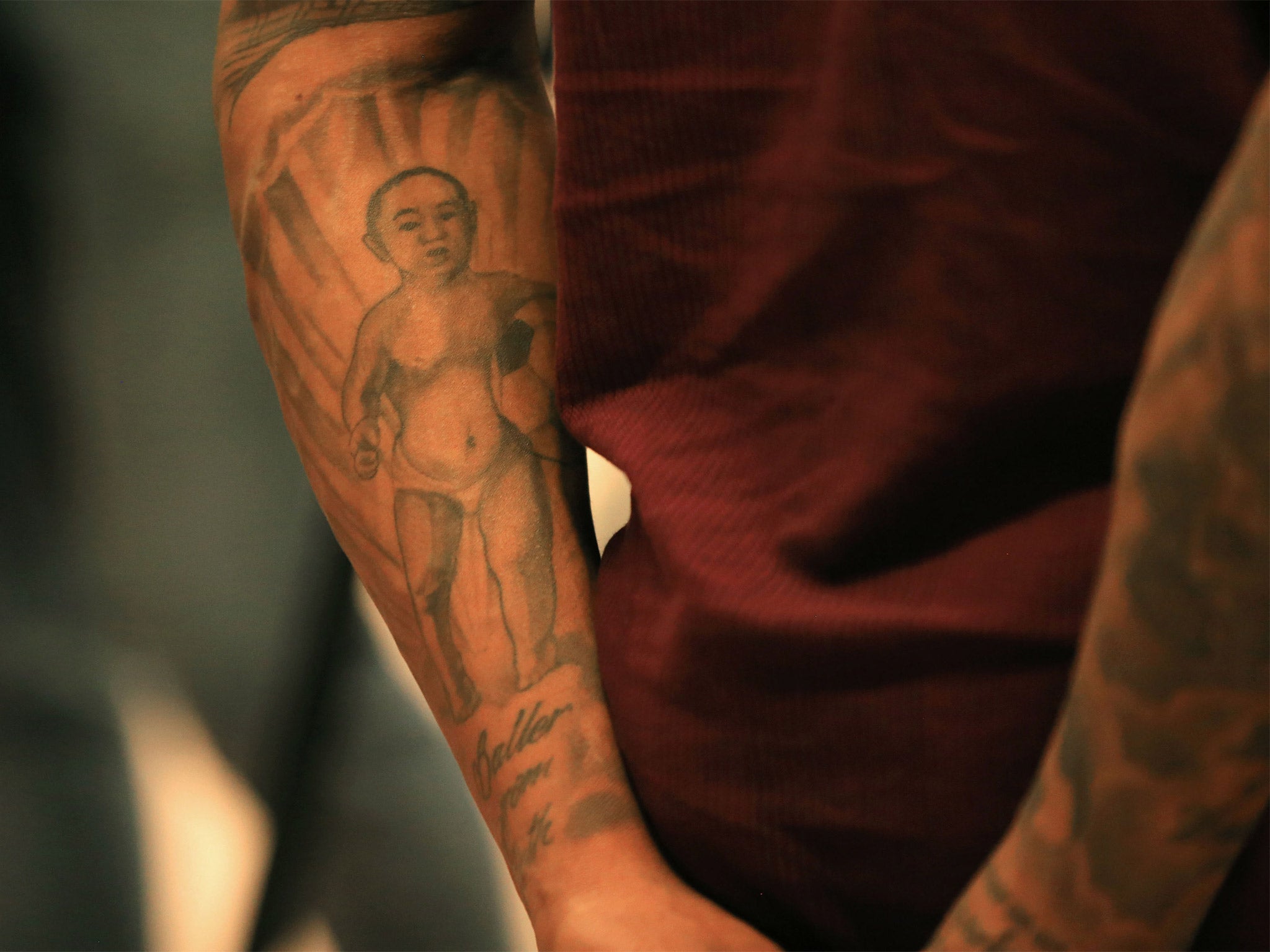 Clyne has his life story tattooed on his arm, including an image of himself as a baby holding a football – which portrays his destiny as a player