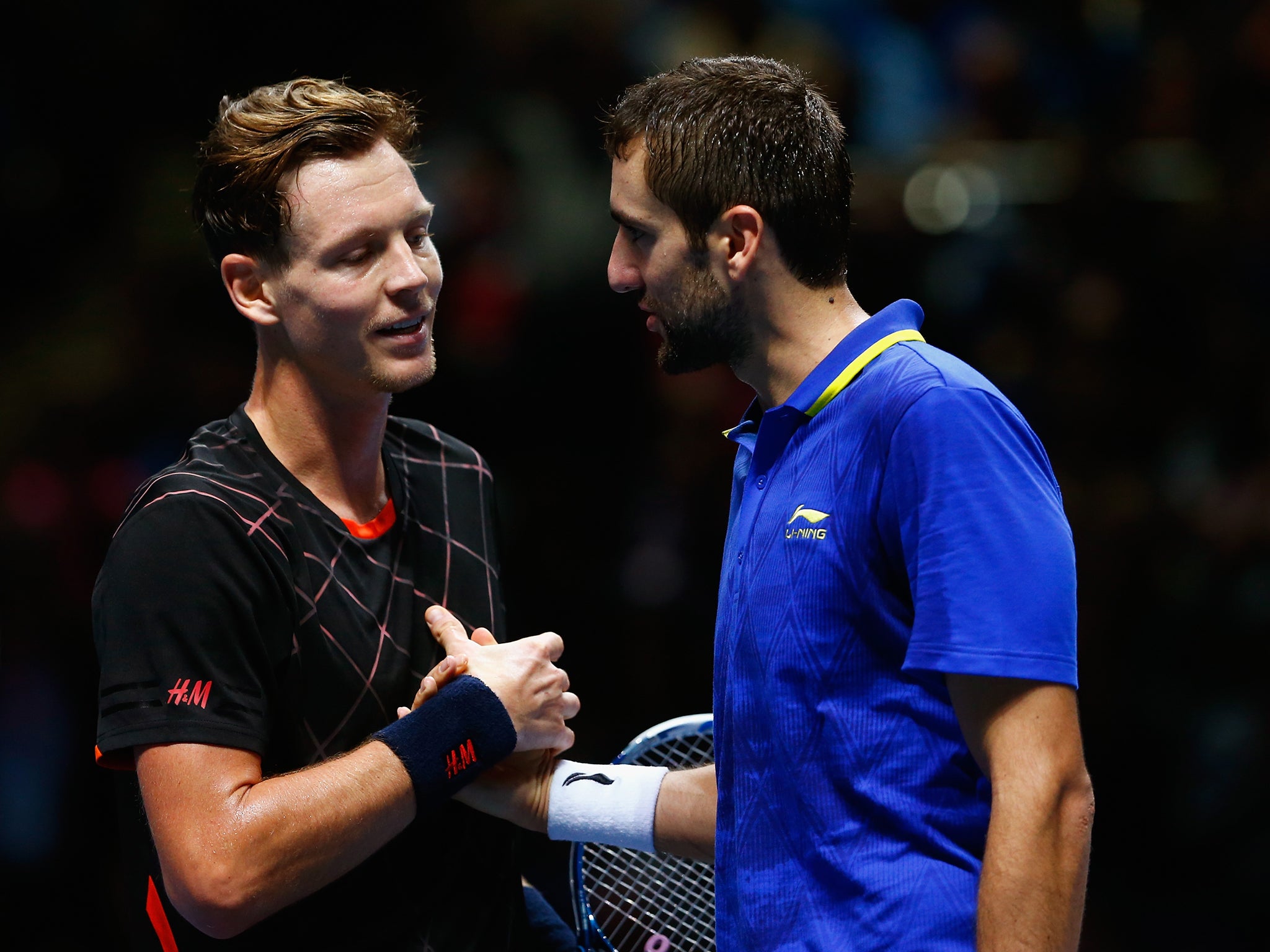 Tomas Berdych of Czech Republic is congratulated by Marin Cilic of Croatia