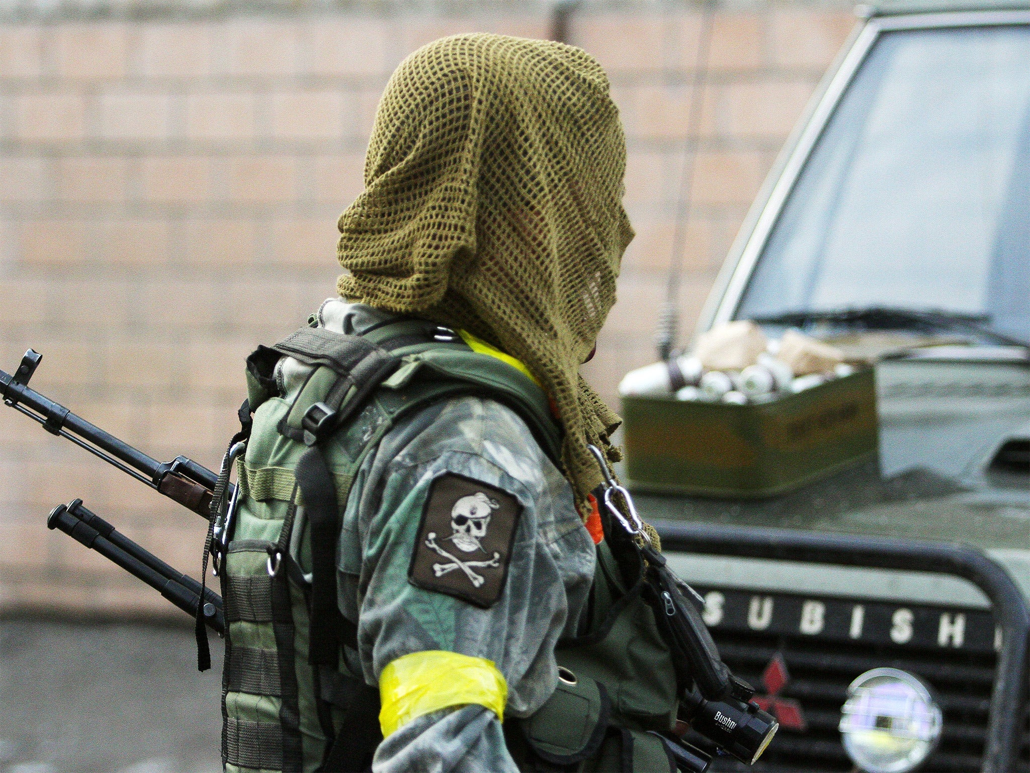 A fighter of the pro-Ukrainian Aidar battalion, a controversial assault unit some of whose members have been accused of criminality, at a base in Schastya in the Luhansk region