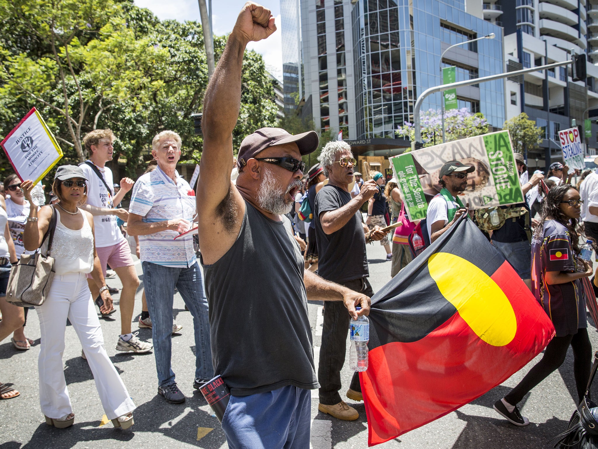 Demonstrators protest in the Brisbane ahead of the G20 Leaders' Summit